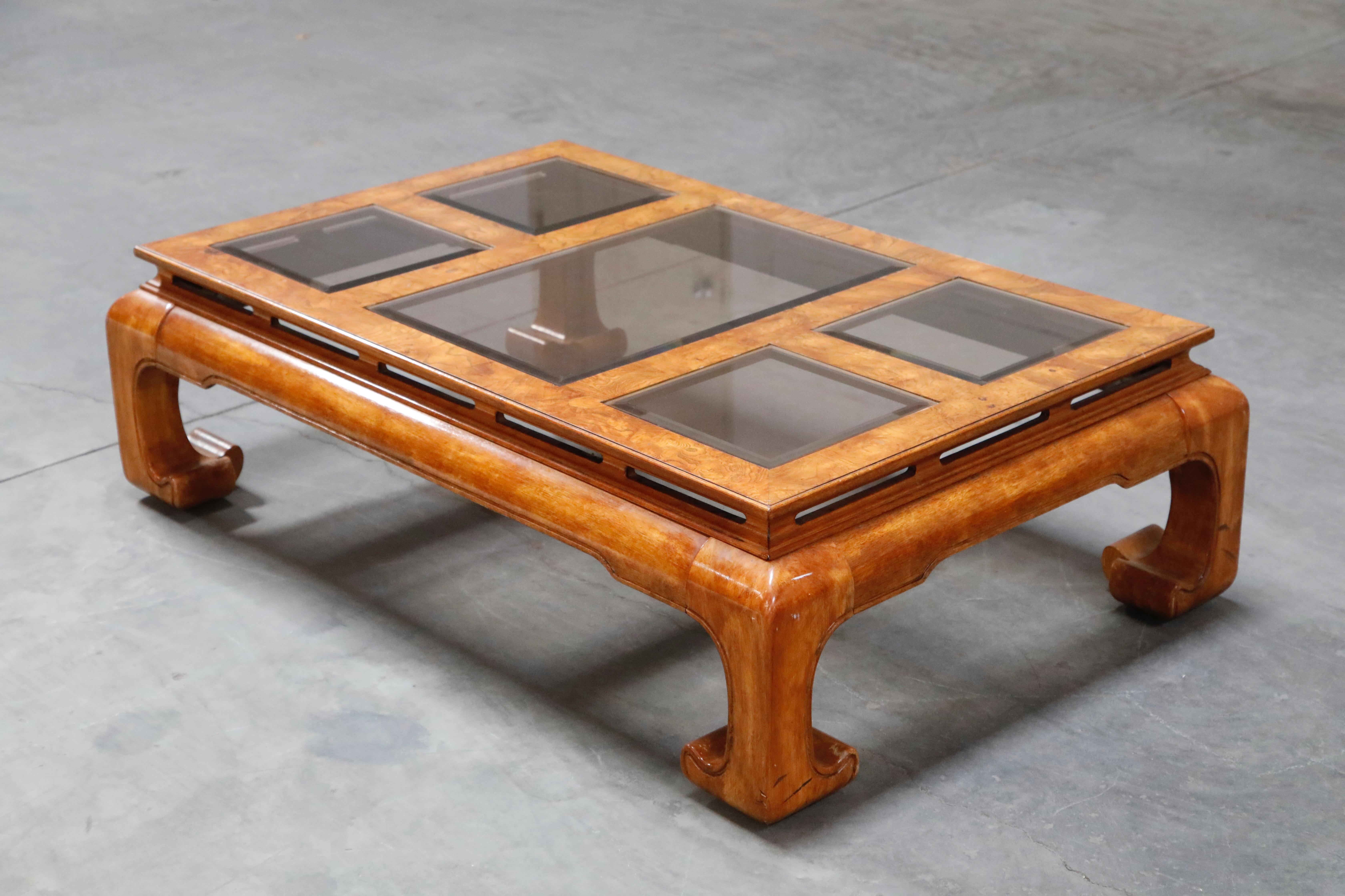 This blast from the past burled wood coffee table and side tables set is by Century Furniture, circa 1970s, in the Ming style, featuring glamorous burled wood and smoked glass tile inserts, with amazing details such as beveled glass for each insert,
