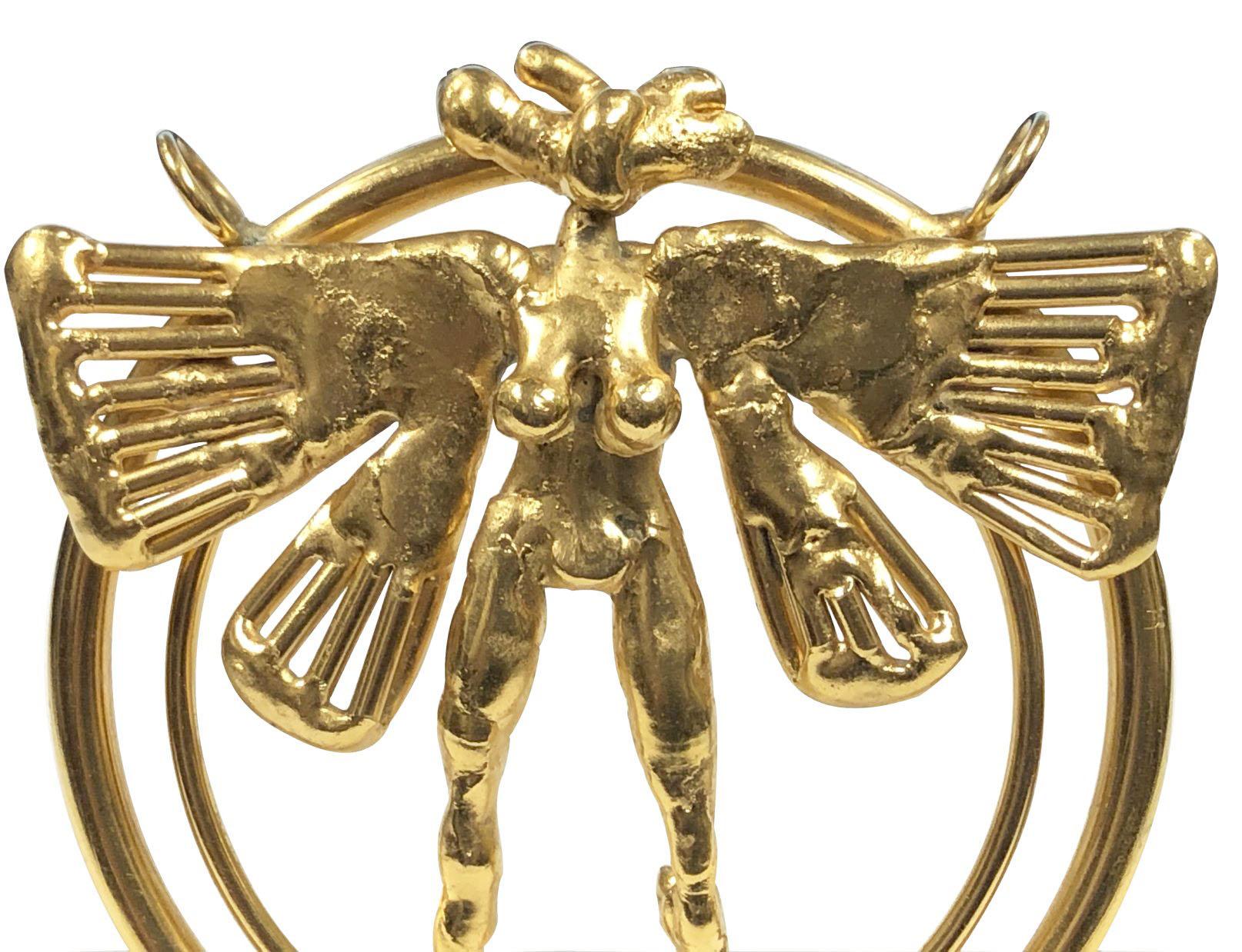 Circa 1975 Large Gold Tone Bronze Nude Winged Figural Pendant by Artist Sculptor Joseph Burlini famous for his Kinetic pieces, this piece measures 3 5/8 inches in diameter and has two loops at the top where a chain can easily slide through to be
