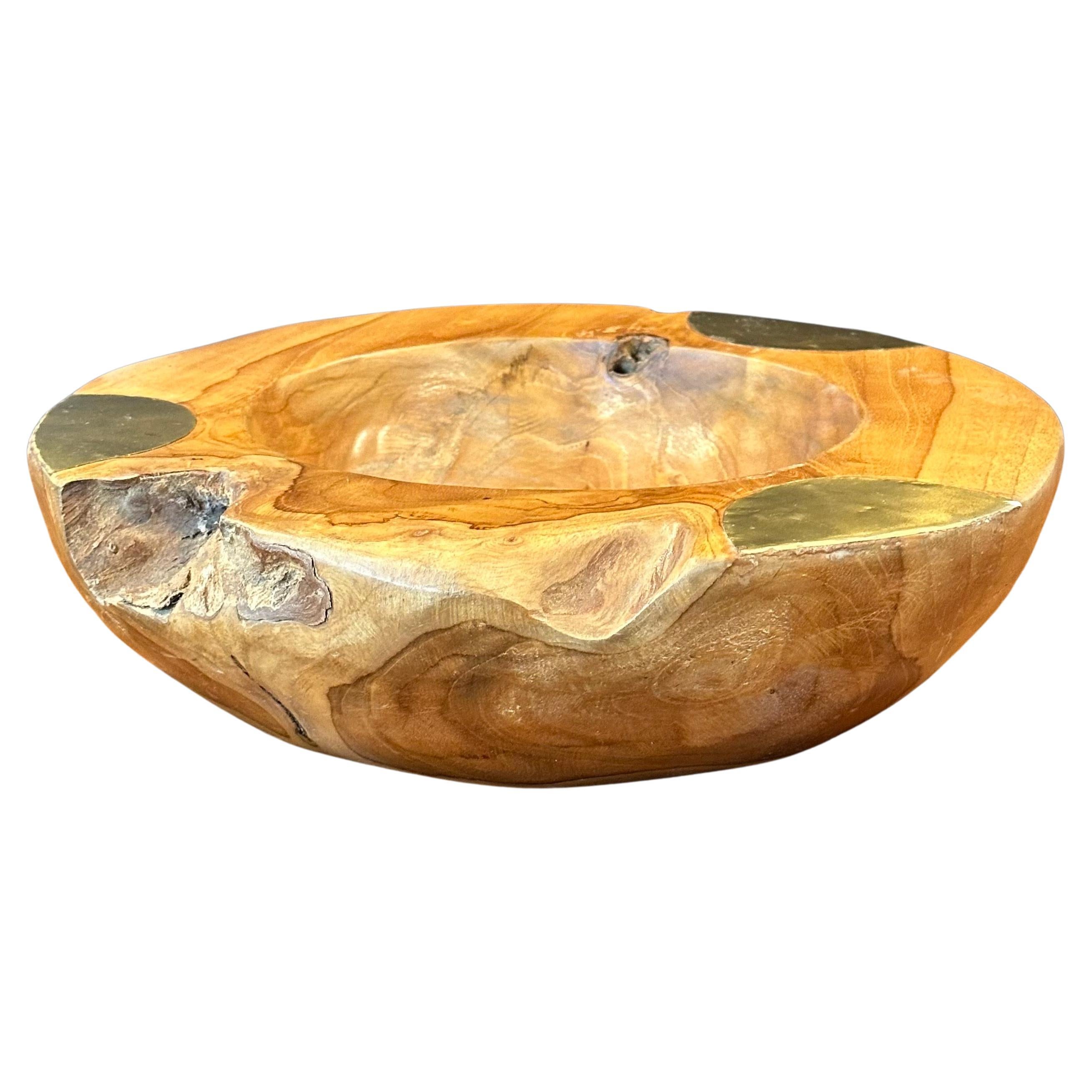 A really cool burlwood centerpiece bowl with brass accents, circa 1980s. The piece is in very good condition and measures 12
