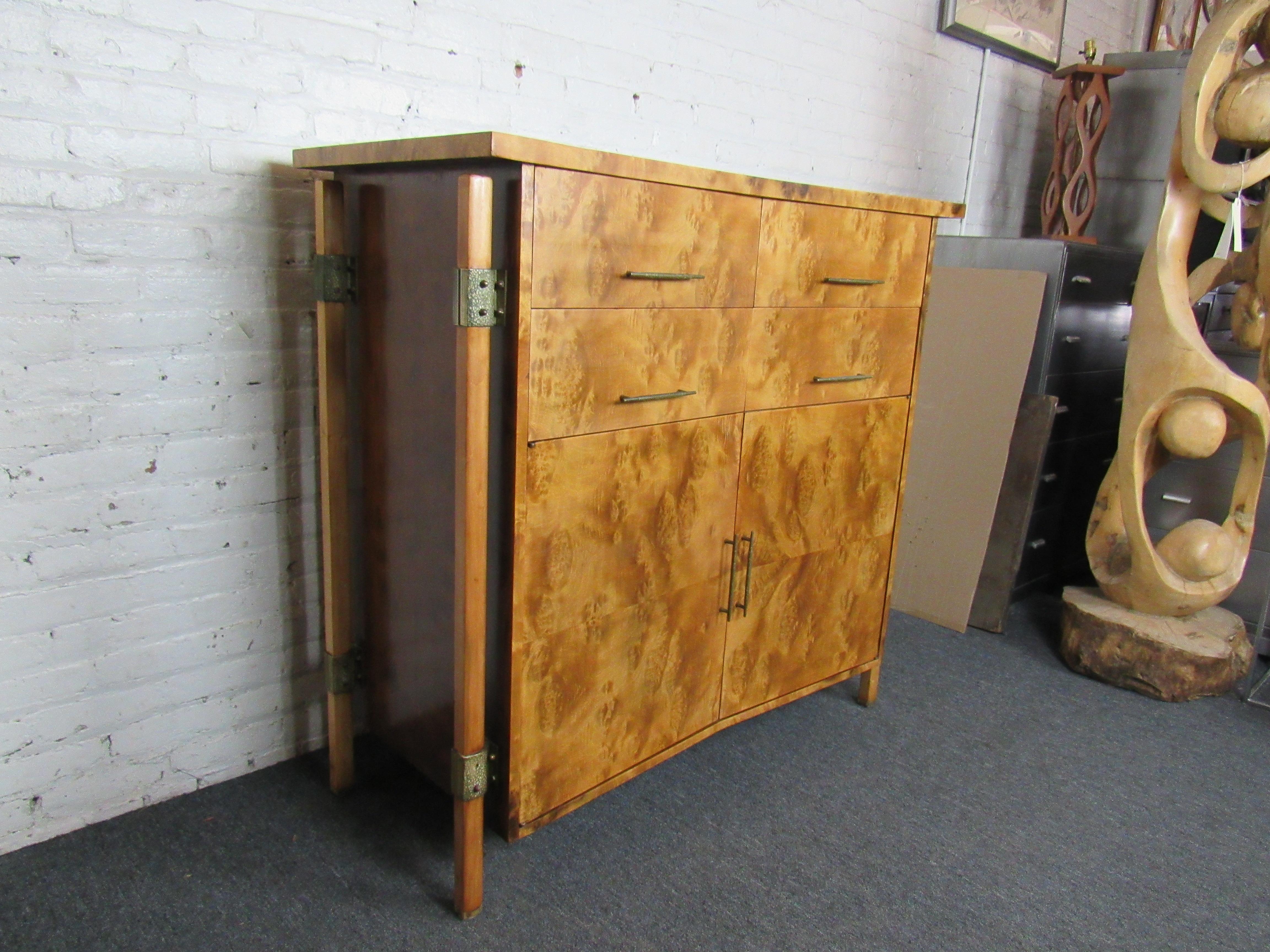 Exceptionally rare burled walnut gentleman's wardrobe from Harold Schwartz' iconic mid-century bedroom collection for Batesville, Indiana's RomWeber Furniture. The swirling natural wood grains create a wonderful contrast with the chest's classic
