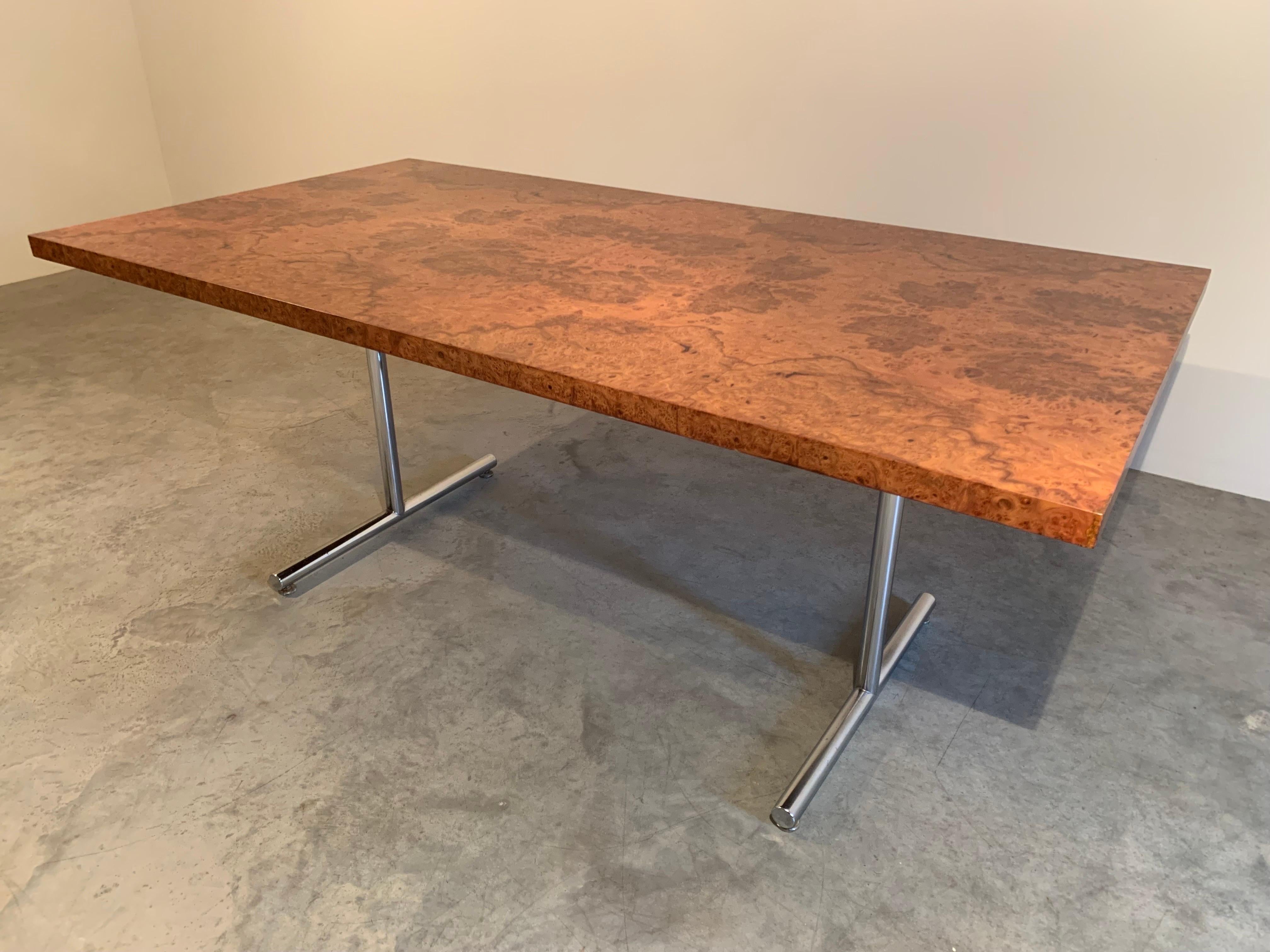 “Omega” desk or table in burlwood having chromed steel legs. Designed by Hans Eichenberger, made by Haussman and Hausmann fo Stendig. -Finland ca 1970

In beautiful overall condition. The top is stunning.