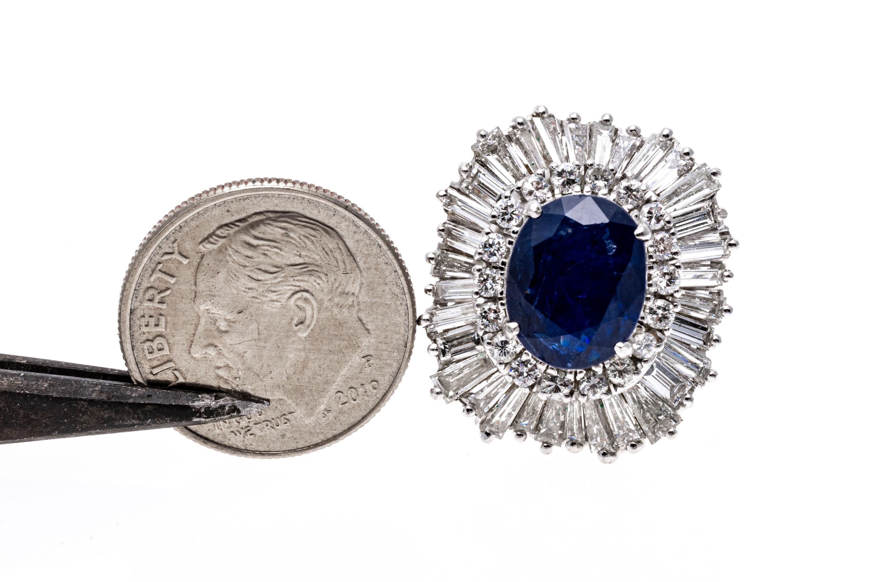 Burma No Heat Natural Blue Sapphire And Diamond Ballerina Ring
This extraordinary platinum ballerina ring has a magnificent natural Burma, no heat, oval faceted sapphire center stone of navy blue color, 2.69 CTS, GIA certed, surrounded by a halo of