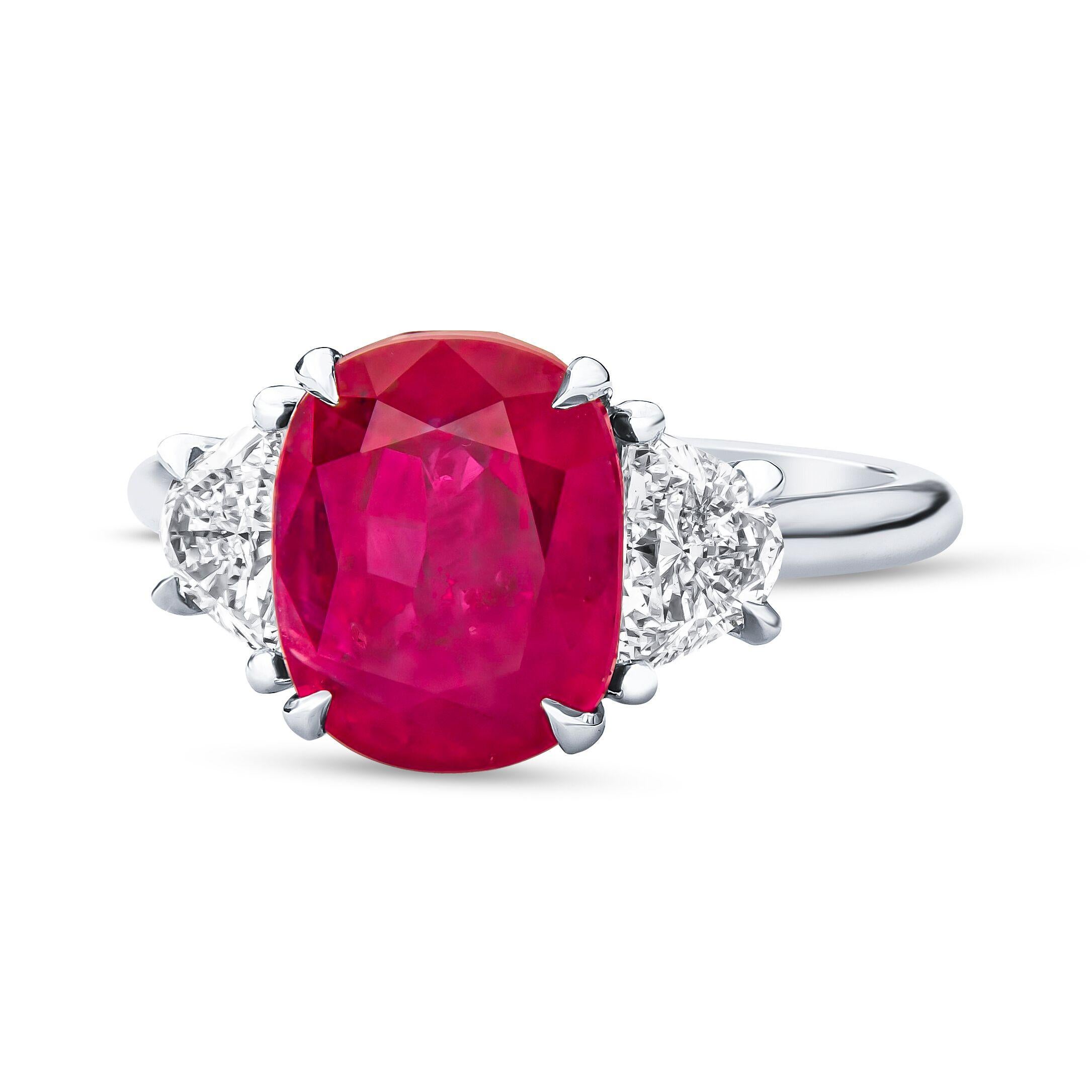 This is an absolutely gorgeous Estate Gubelin certified 5.53 CTW Burmese Ruby And Diamond Engagement Cocktail Ring. The center stone is a gorgeous vivid red color and absolutely eye clean that weighs 4.43 carats. It has been certified by the best