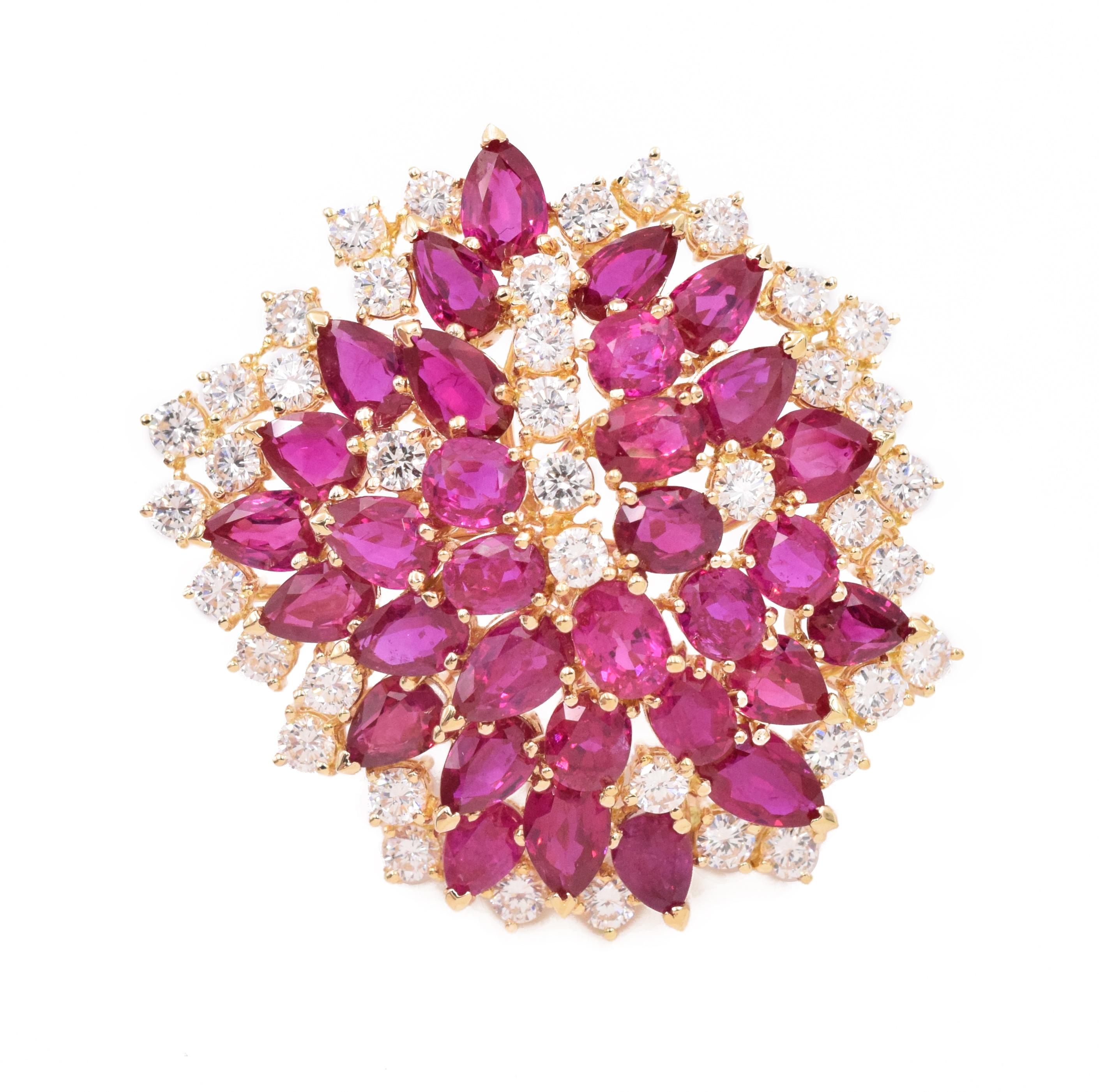 Pink sapphire & diamond leaf design brooch in 18k yellow gold. Set with 32 oval and pear shape pink sapphires  weighing total of approx. 15carats and 40 round brilliant cut diamonds weighing 6 carats
 The back of the brooch has a bail, can be used