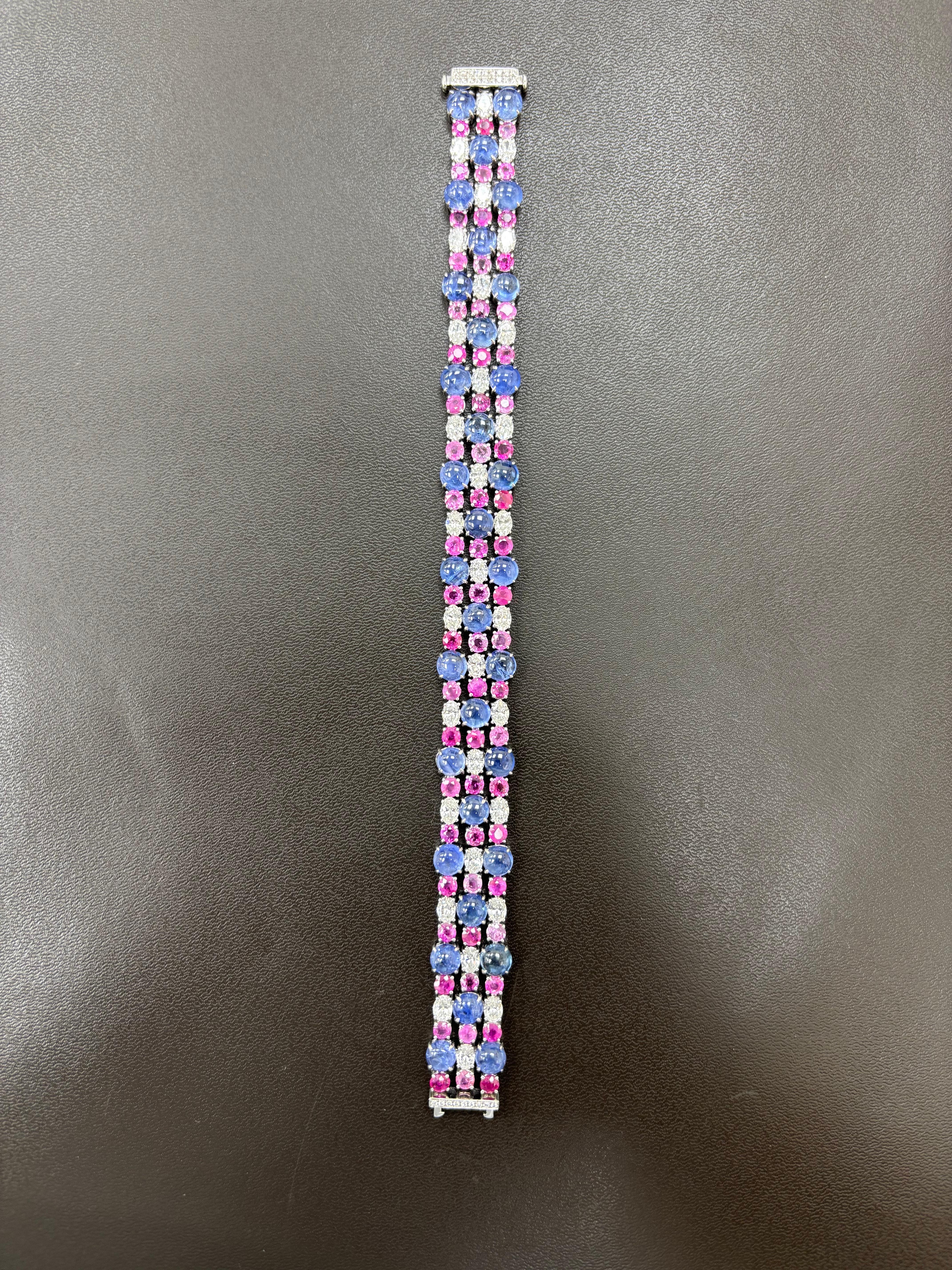 This exquisite bracelet embodies timeless elegance and sophisticated craftsmanship. Crafted in luminous platinum, it showcases a stunning array of vibrant gemstones that captivate the eye. At its center are rare Burmese no heat sapphires, renowned