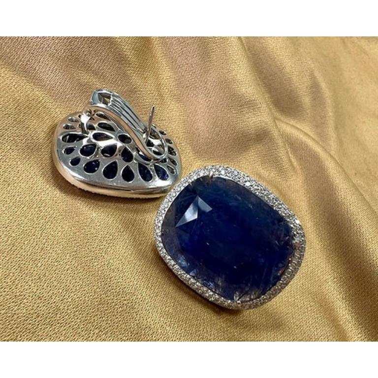 Sapphire Weight: 72.83 CTS, Diamond Weight: 1.00 CTS, Metal: 18K White Gold, Shape: Cushion, Color: Intense Blue, No indications of heat, Origin: Burma (Mayanmar), Hardness: 9, Birthstone: September, CD Certified