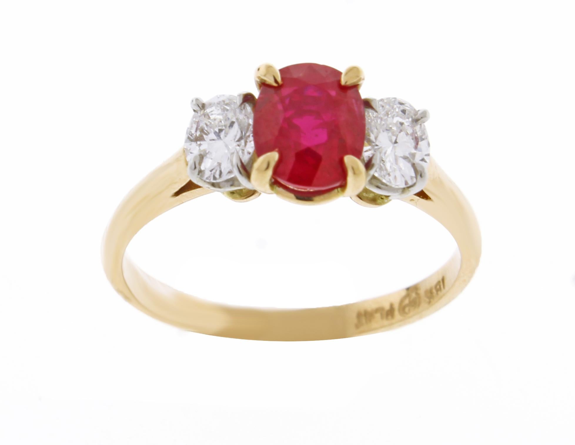 From Pampillonia jewelers an oval Burma ruby and diamond hand made ring.
♦ Designer :Pampillonia
♦ Metal: 18 karat and platinum
♦  Oval ruby =1.08 carats A.G.L certified Burma non heated
♦ 2  Oval diamonds=.45 carats F color VS clarity
♦ Circa