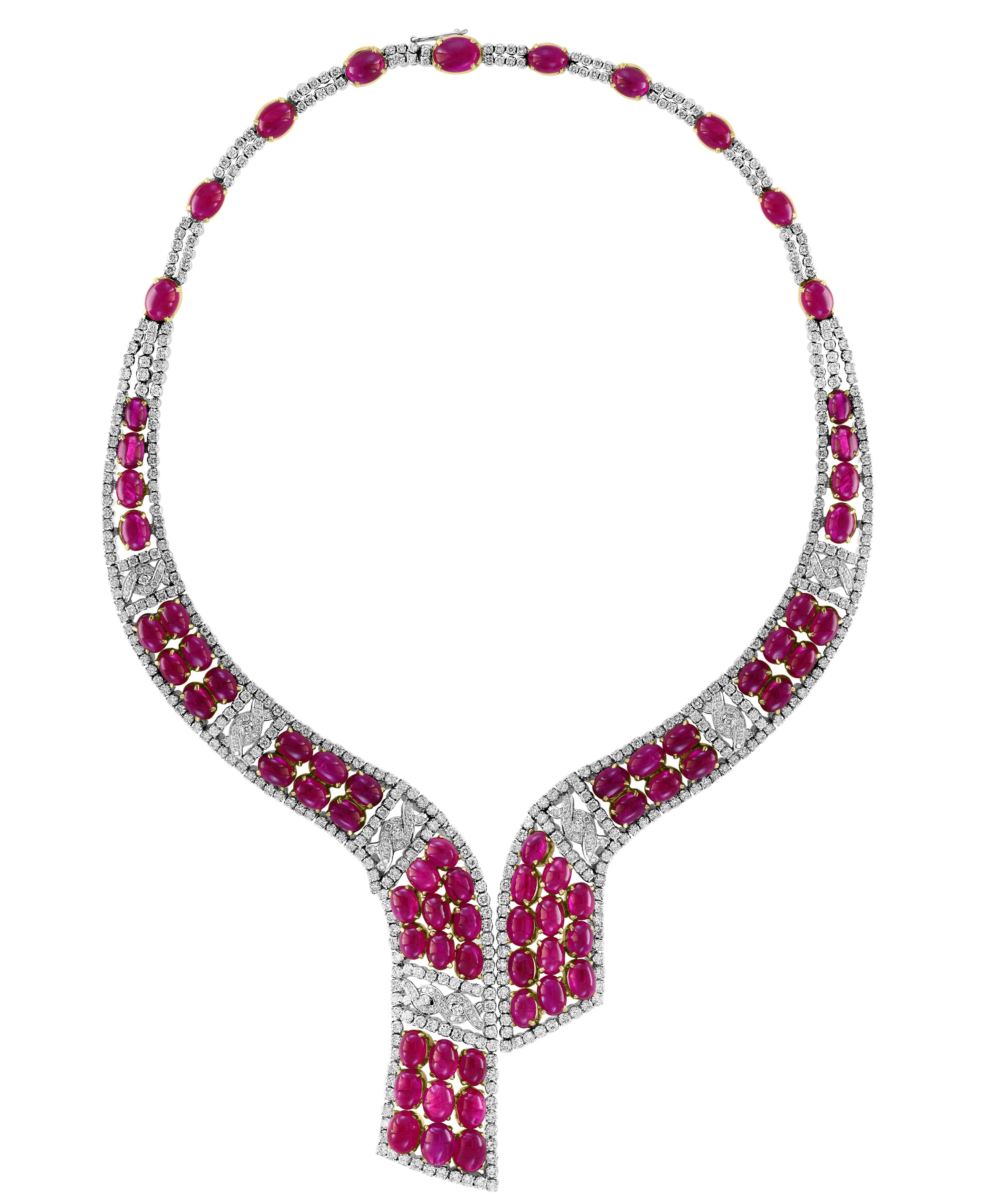 
GIA Certified 112 Ct Burma Ruby Cabochon & 25 Carat Diamond Necklace Suite 18 Karat Yellow gold 
This bridal suite made out of 18 Karat gold .Necklace consisting of oval shape natural Burma Ruby cabochon having a total weight of 112 carats set with