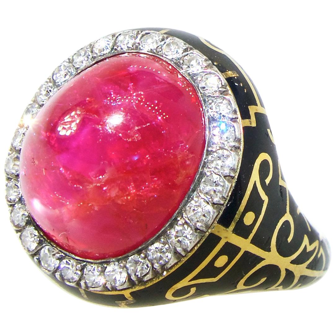Burma Ruby which is natural unheated, untreated and accompanied with a certificate, this Burma ruby weighs approximately 8.5 cts.  This antique ring in gold and silver is quite unusual with fine detailed black enamel, in perfect condition and with