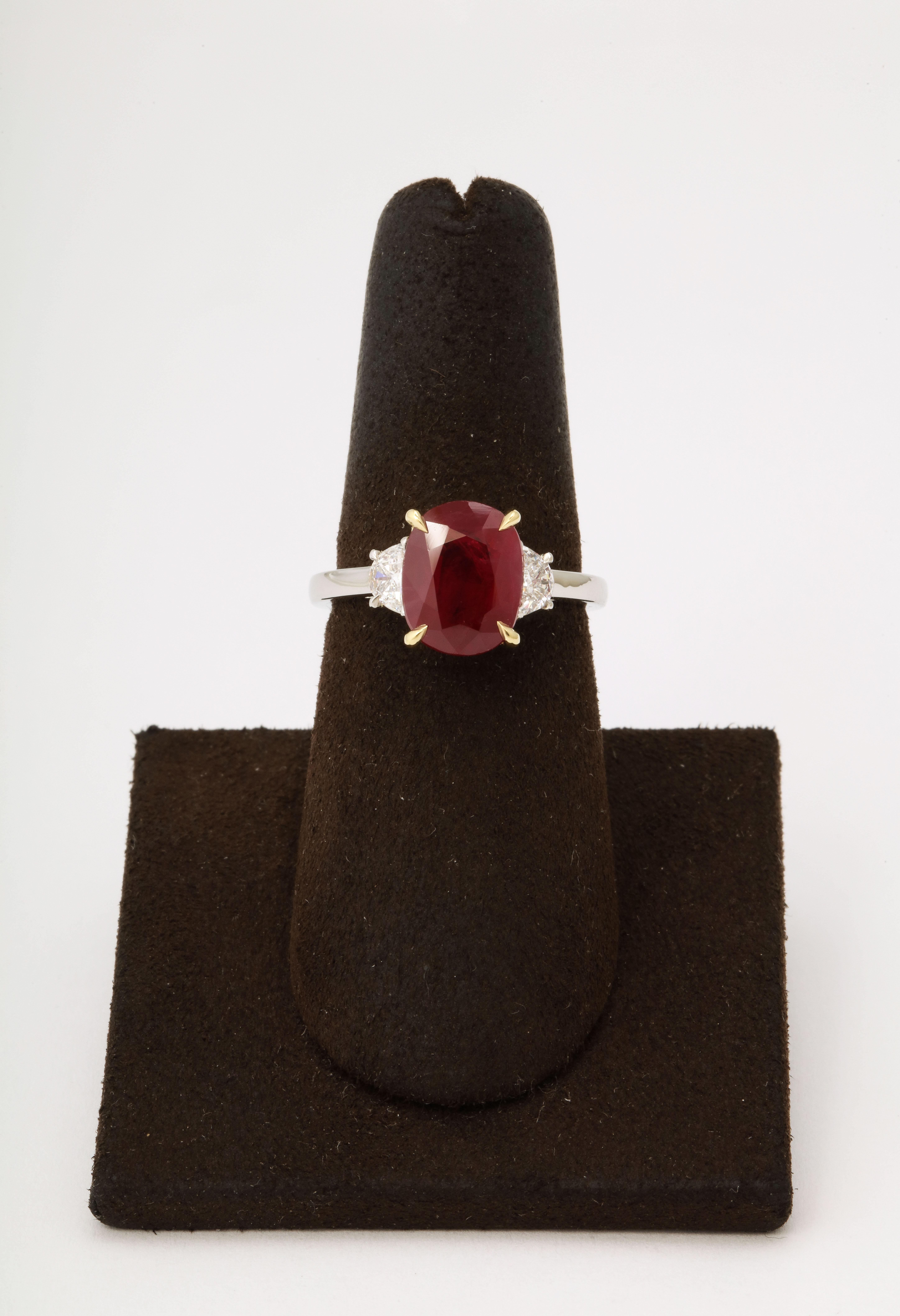 
2.97 carat certified Fine Burma Ruby. 

.38 carats of size diamonds.

Set in platinum and 18k yellow gold 

Currently a size 6.5, this ring can easily be resized. 

Certified by Christian Dunaigre of Switzerland. The certificate is available on
