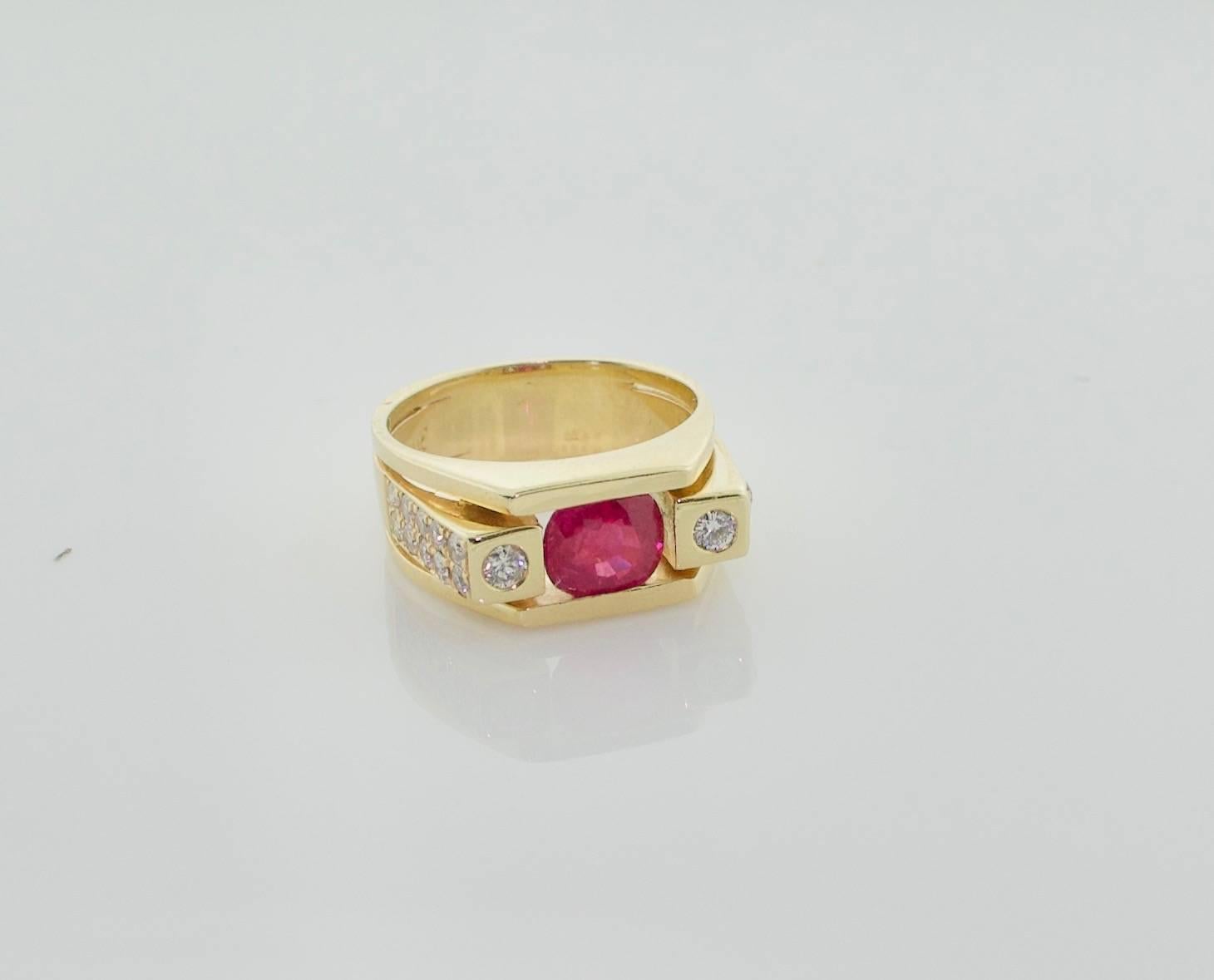 Burma Ruby and Diamond Ring in 14k Yellow Gold
A Cushion Cut Burmese Ruby weighing 1.50 carats approximately
Twenty Two Round Brilliant Cut Diamonds weighing .50 carats approximately GH VVS-VS1 
Signed HH.  Harry Hamlin?  Herman Hees?  Your Guess is