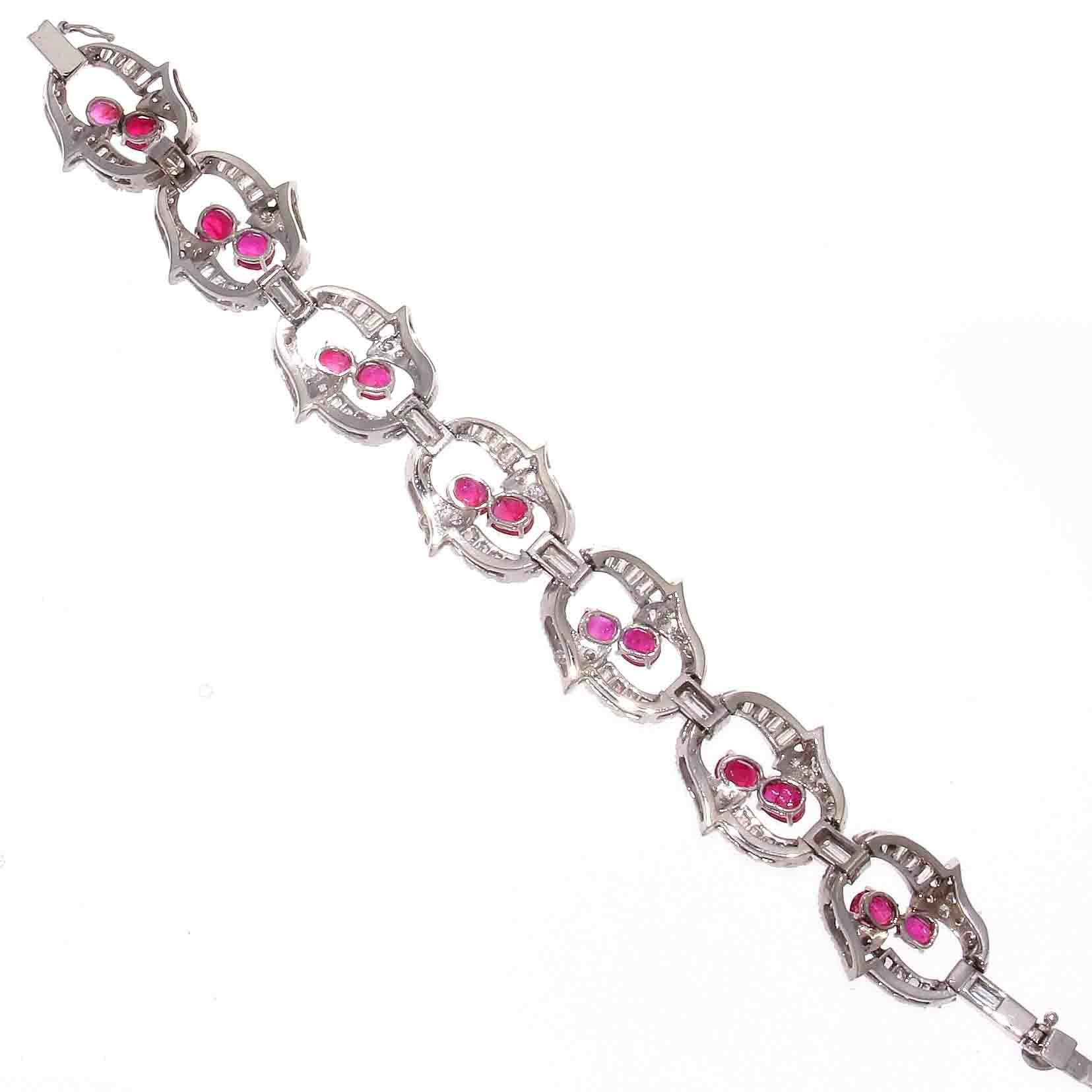 Beautiful midcentury bracelet. Featuring Burma rubies and near colorless diamond. Crafted in platinum. 
