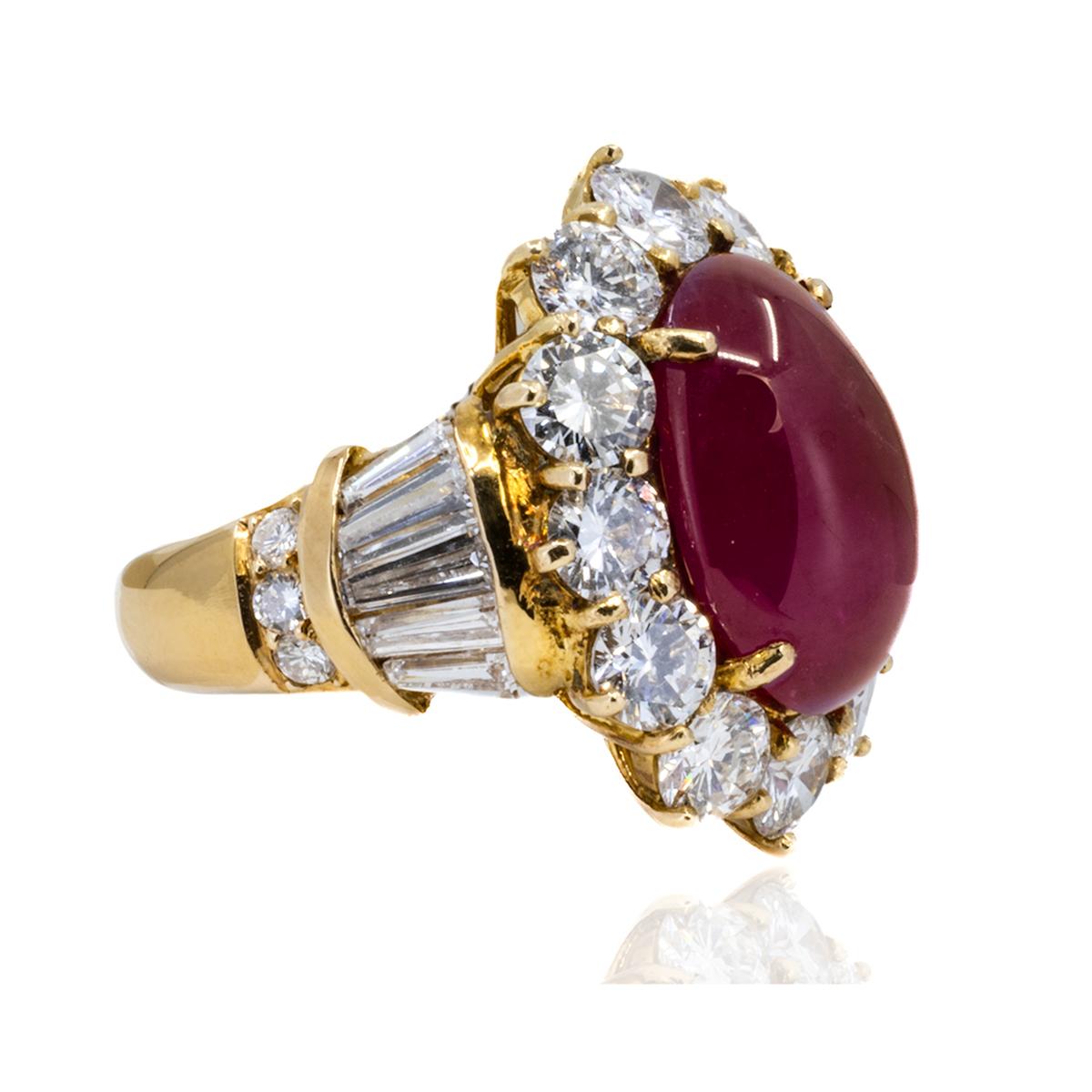 AGL certified 7.98 carat cabochon Burma Ruby set in 18k mounting with 18 round brilliant and 10 tapered baguette diamonds weighing 5.11 carats, 9.89g