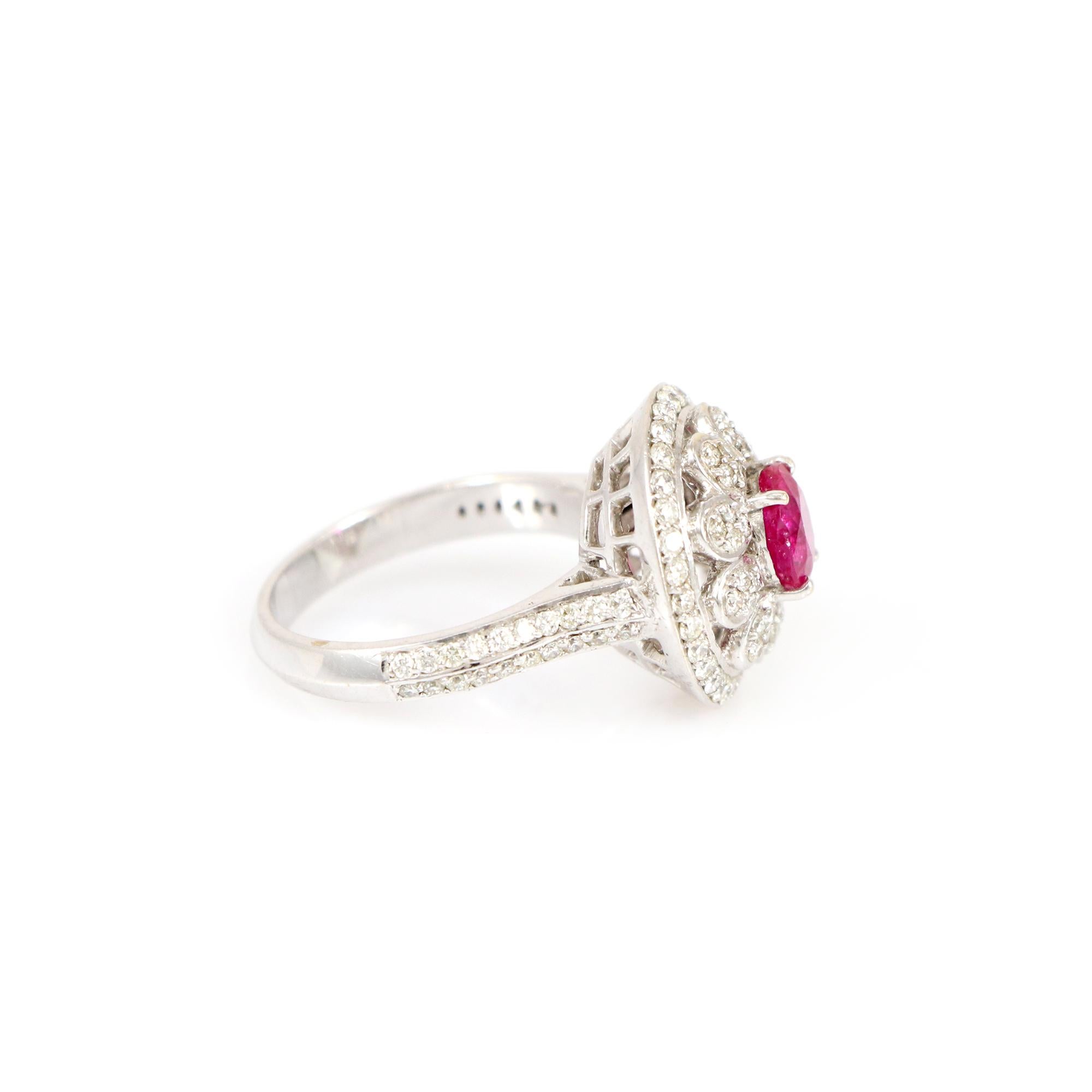 Experience enduring elegance with our exquisite gold ring, adorned by a captivating natural Burma Ruby (No heat), and encircled by round-shaped diamonds, exuding unparalleled refinement. The deep, opulent red hue of the Ruby harmoniously melds with