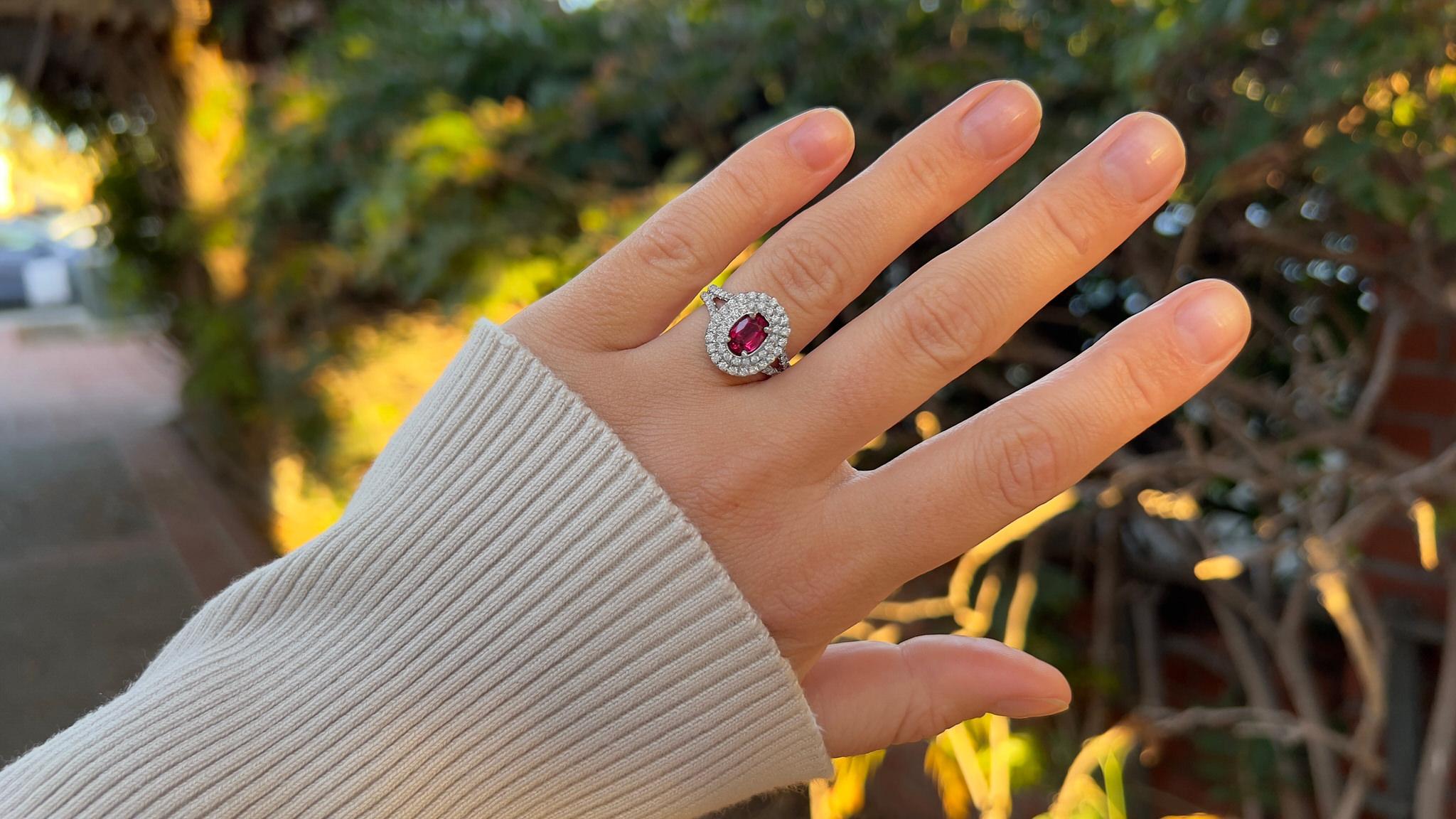 Burma Ruby = 0.87 Carat
(Cut: Oval, Color: Red, Origin: Natural)
Diamond = 0.70 Carats
(Cut: Round, Color: F, Clarity: VS)
Metal = 18K White Gold
Ring Size = 6.5