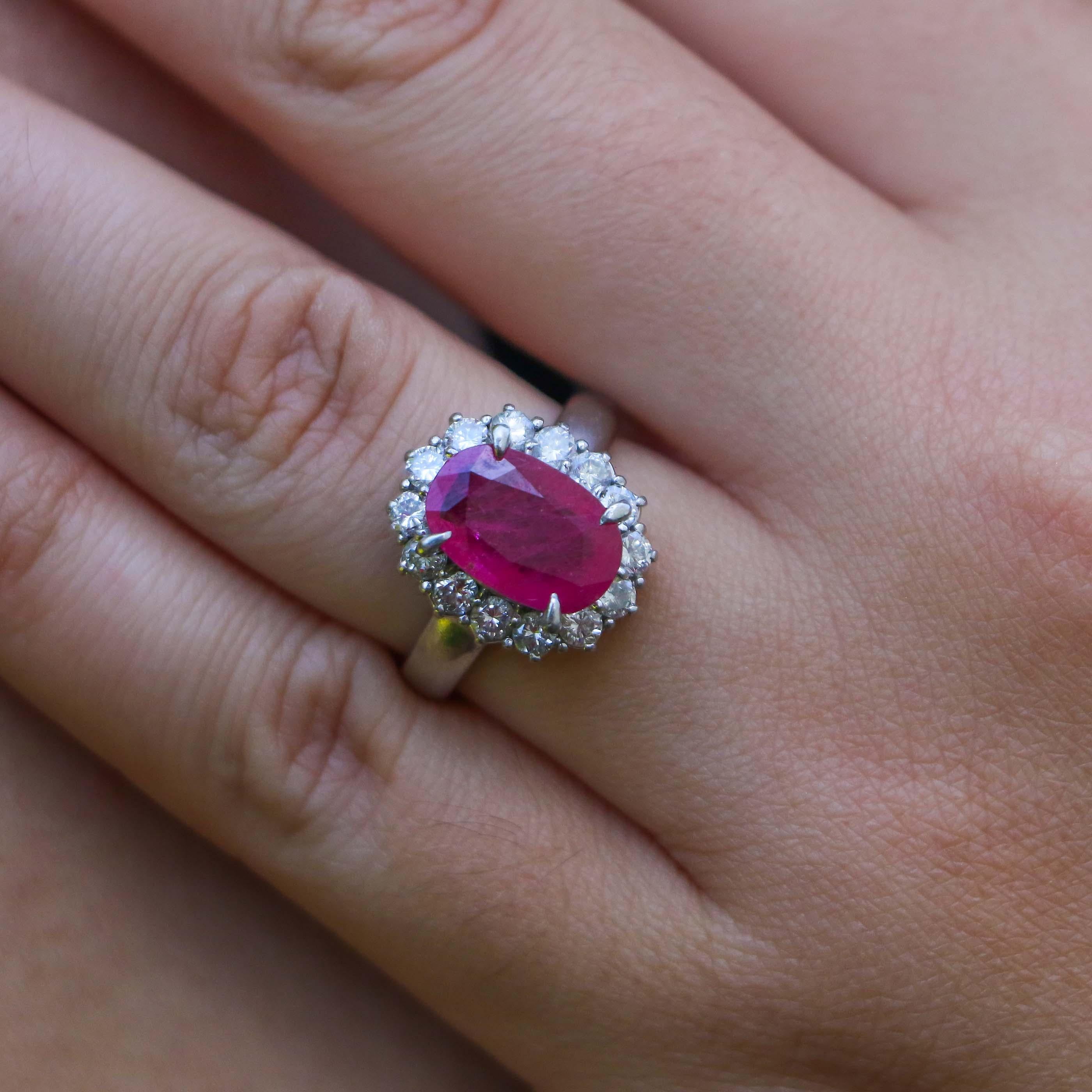 Apart of our carefully curated collection, this ring proudly displays a 3.70 carat Burma ruby crowning a platinum band. The ruby's prongs hold the stone tightly but allow it to be seen in its entirety. The center stone is surrounded by beautiful