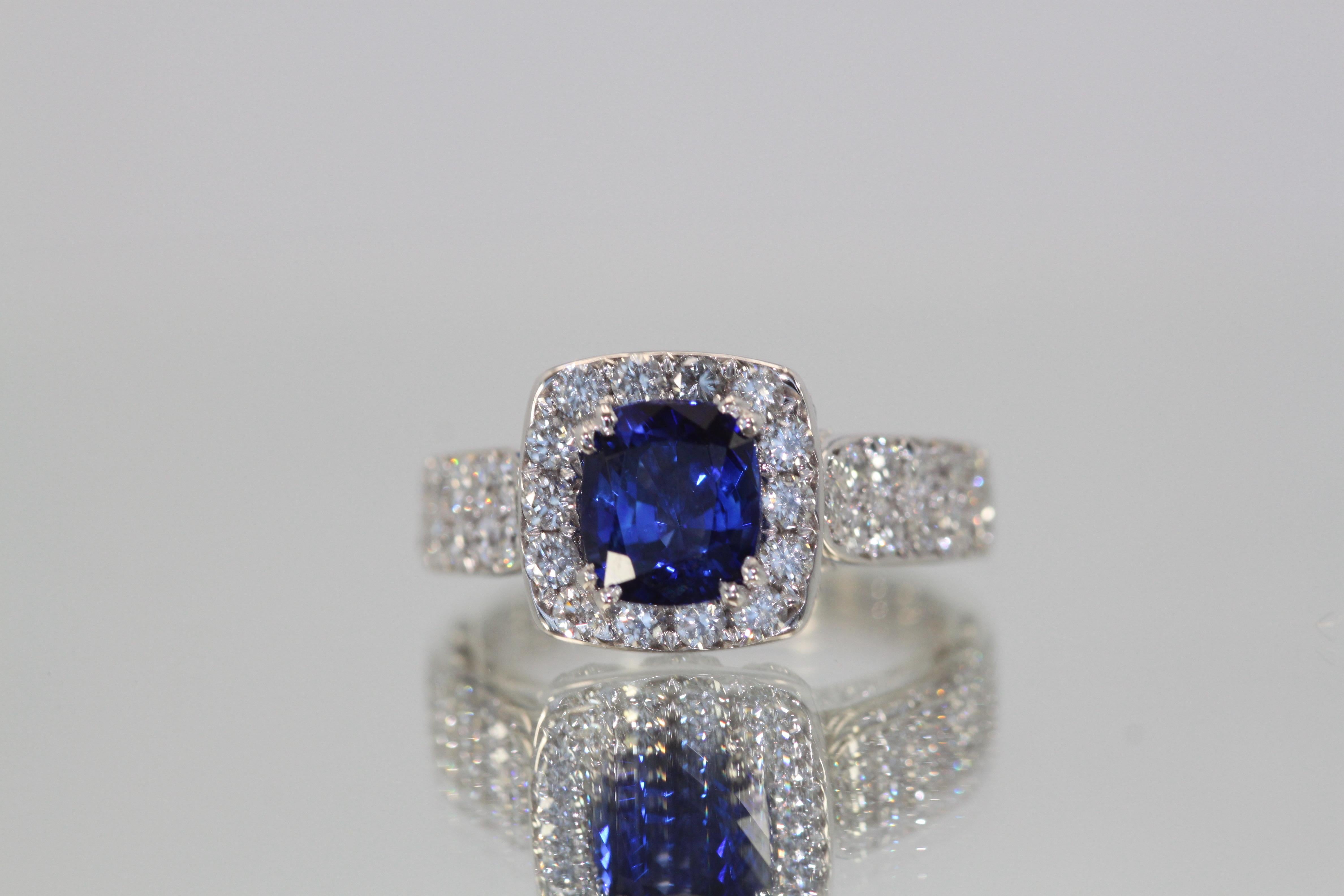 Round Cut Burma Sapphire Ring with Diamond Surround 18 Karat For Sale