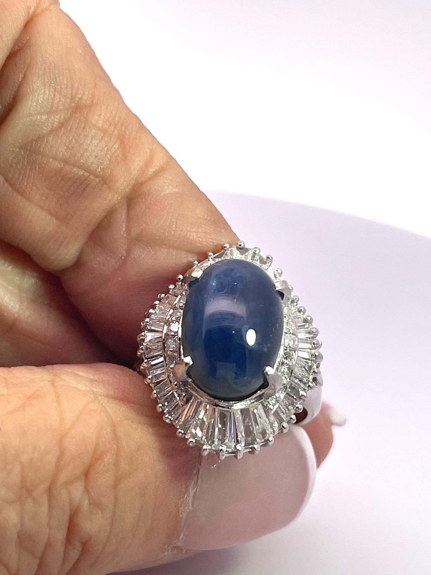 This Star Sapphire is a unique and beautiful stone.  It's a rare find, and I'm sure it will be a treasured possession for its new owner.  This ring with the Star Sapphire and the Diamonds total 11 Carats.  The Sapphire is Burma with no heat and
