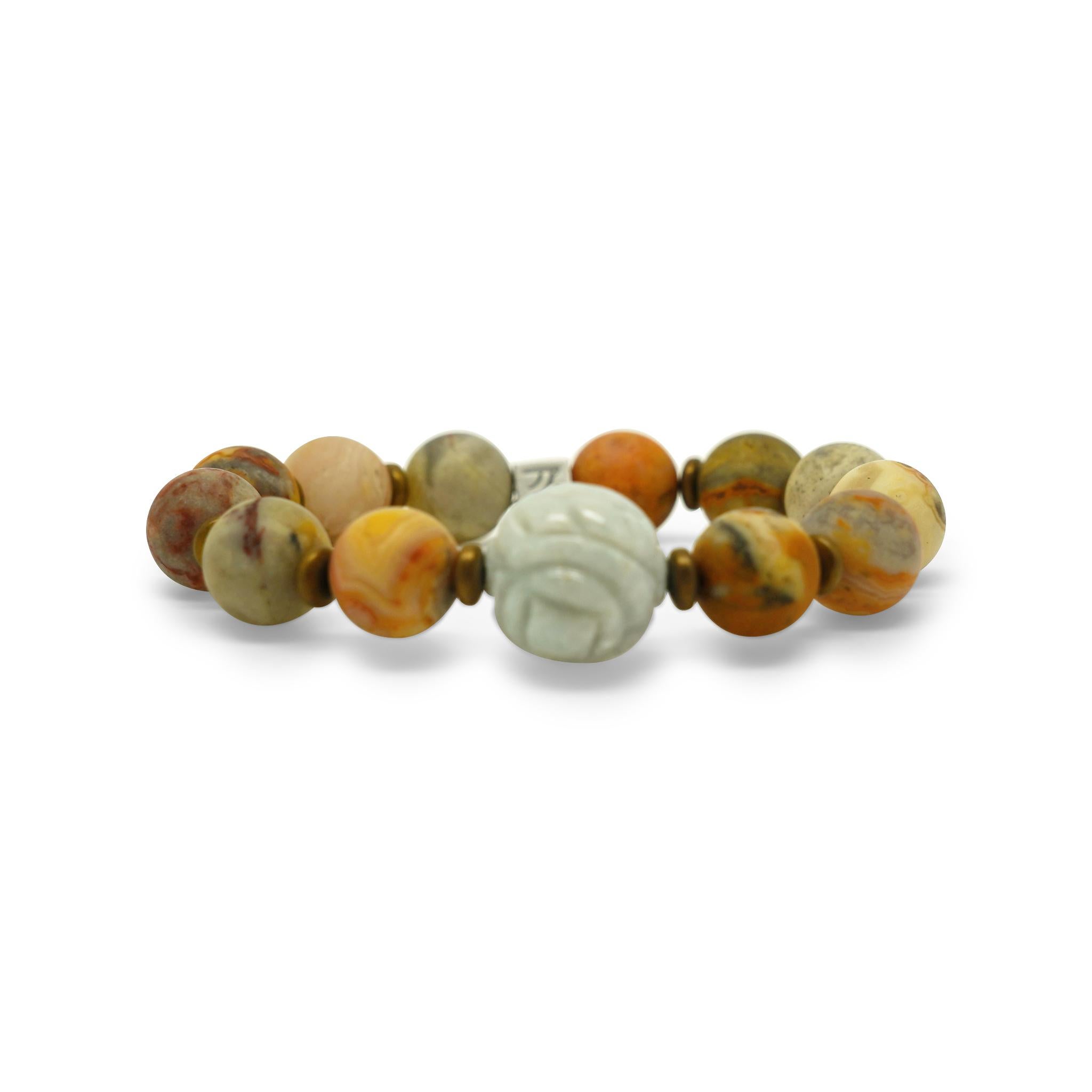 Behind the Jewelry
The beautiful carved Burmese Jade center piece adds an exquisite style to this Picture Jasper bracelet. Jade has a rich history in the Orient, especially China . Historically, the term jade was applied to any of a number of