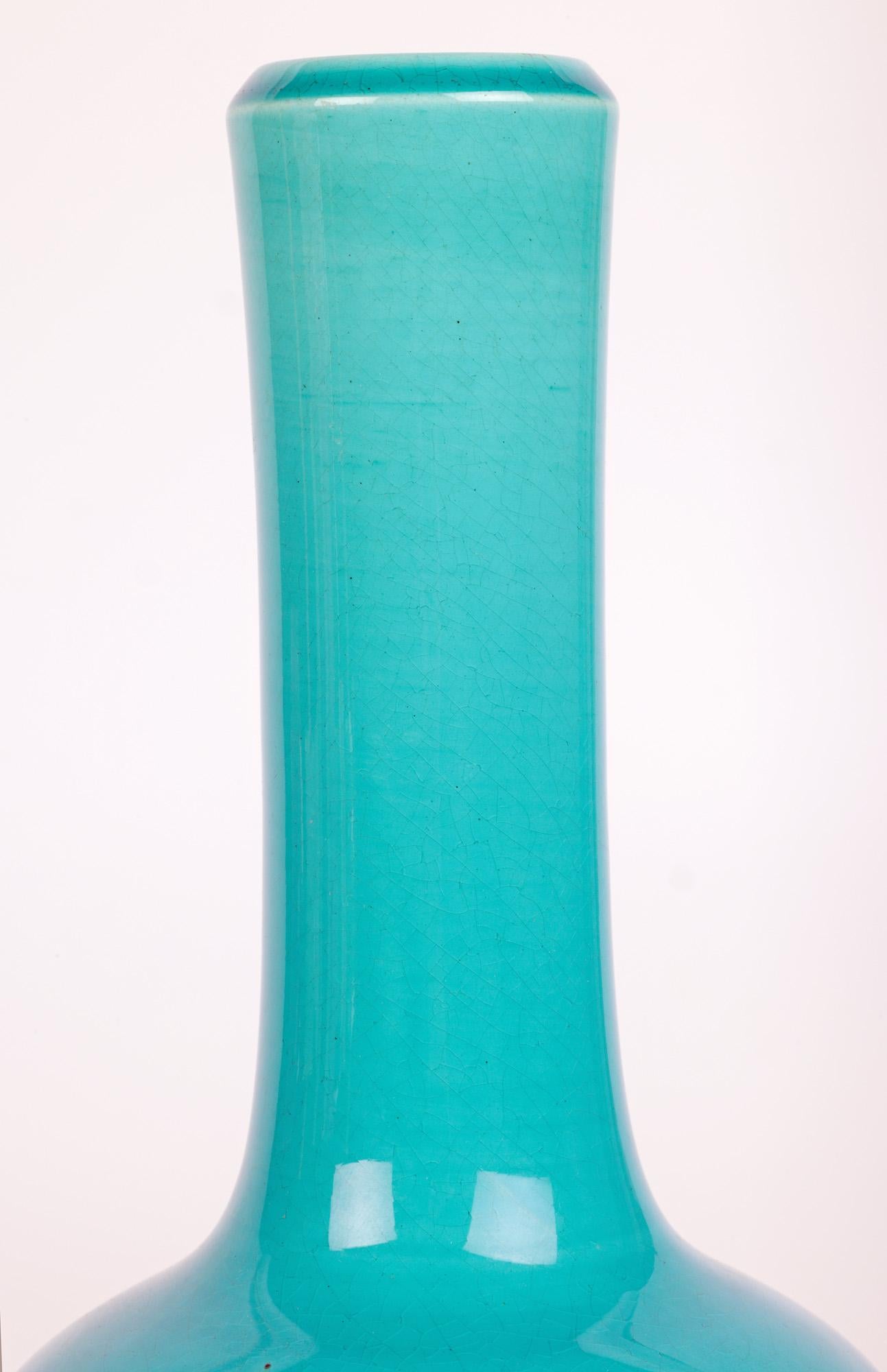 A stylish Burmantofts Arts & Crafts turquoise glazed art pottery bottle shaped vase made in Leeds and dating from around 1890. 

The vase is part of a private collection of Arts and Crafts influenced pottery amassed in the mid 1980’s. The collection