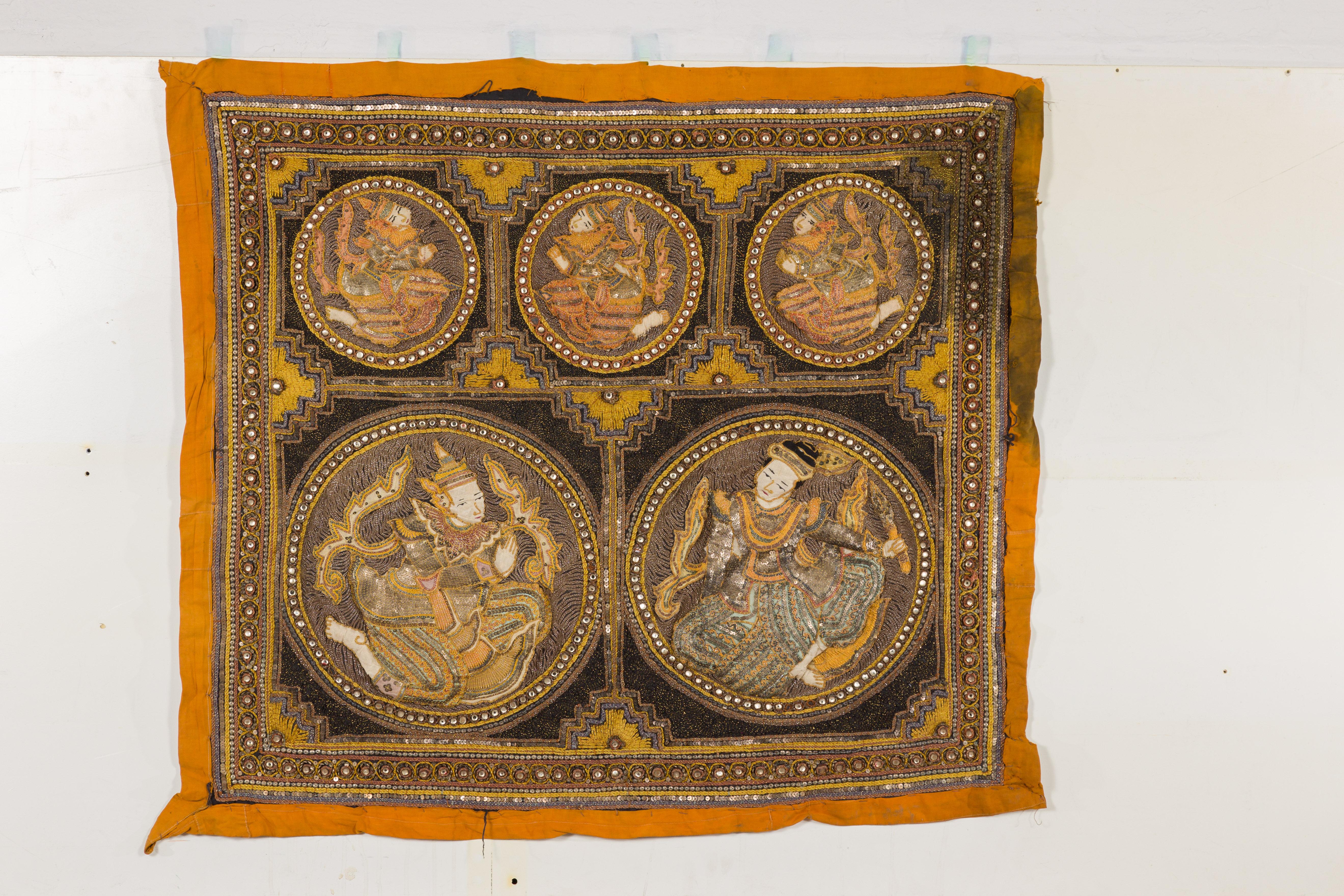 A 19th century Burmese Kalaga tapestry with stones, sequins and golden thread. Immerse yourself in the grandeur of Burmese craftsmanship with this captivating 19th-century Kalaga tapestry. A cultural treasure from Burma (now Myanmar), this tapestry