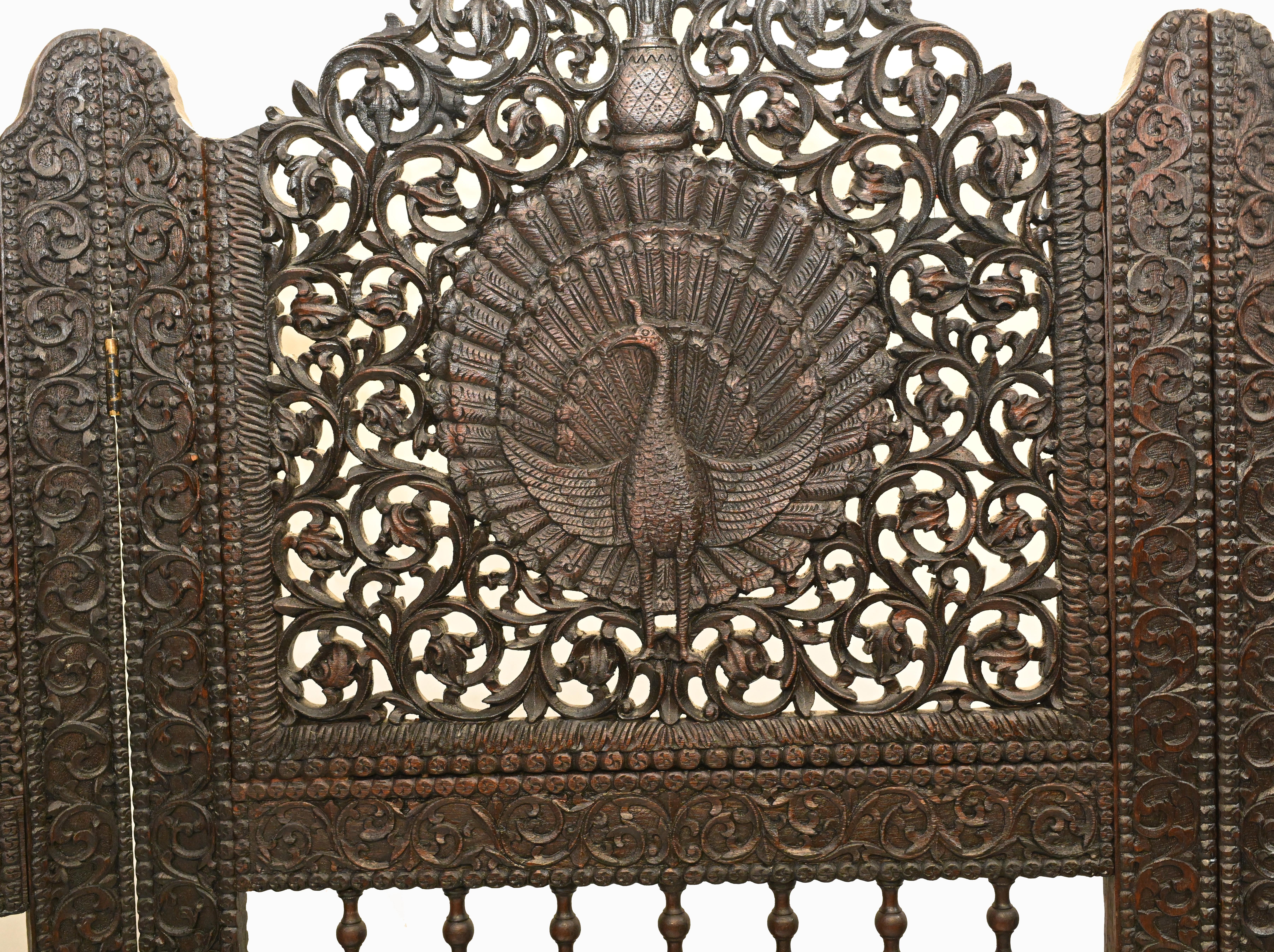 Hats off to our buying department for securing this work of art
We are proud to present this antique five panel Burmese screen
Just look at the carving to this piece, a real feat of craftsmanship
Features profusely carved figurines and