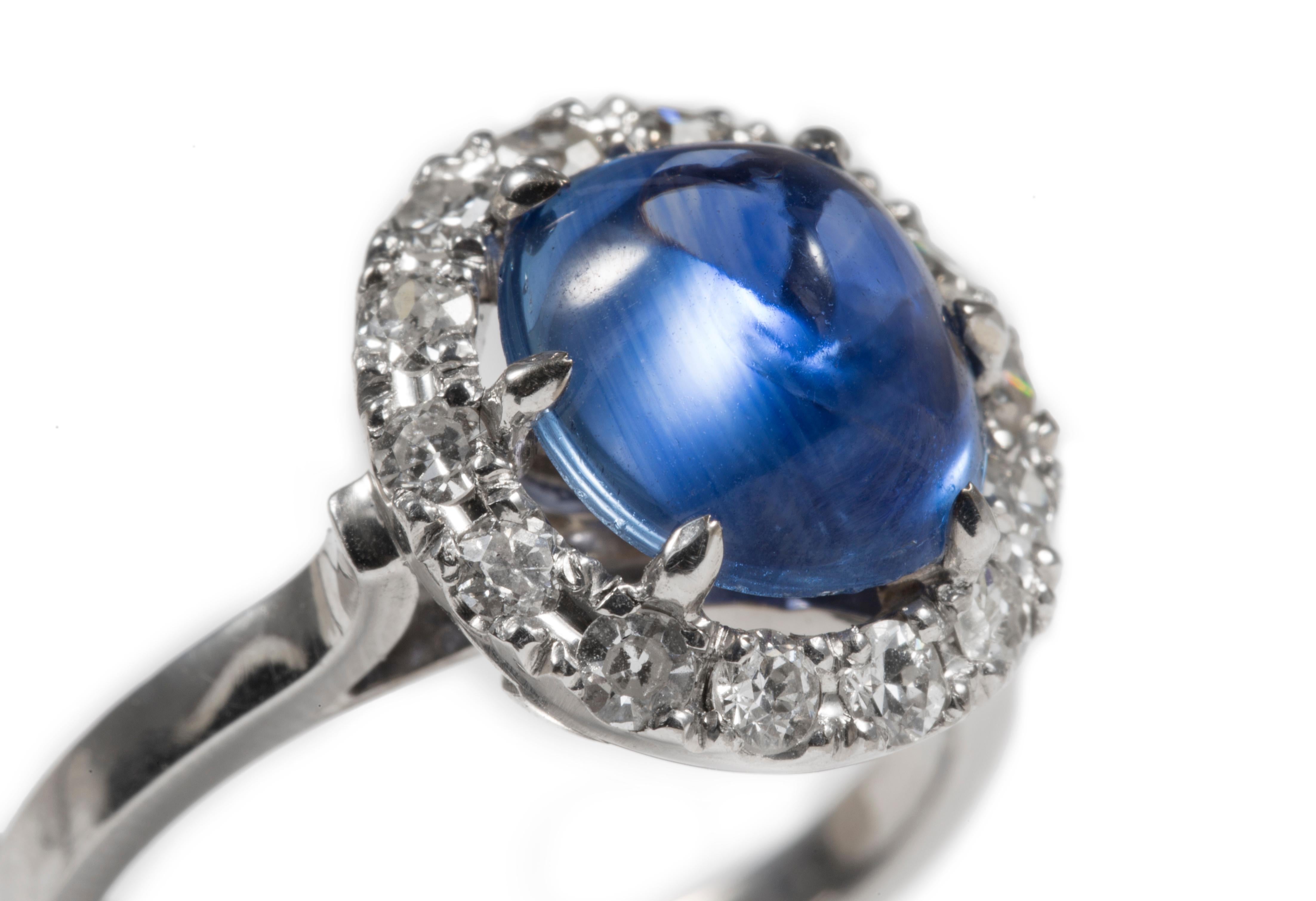 Evergreen Burmese Blue sapphire Ring with Diamonds in 18K white gold

Ring size: 6.5 ( can be sized )

18K Gold: 6.50gms
Blue Sapphire: 4.15cts
Diamond: .30cts