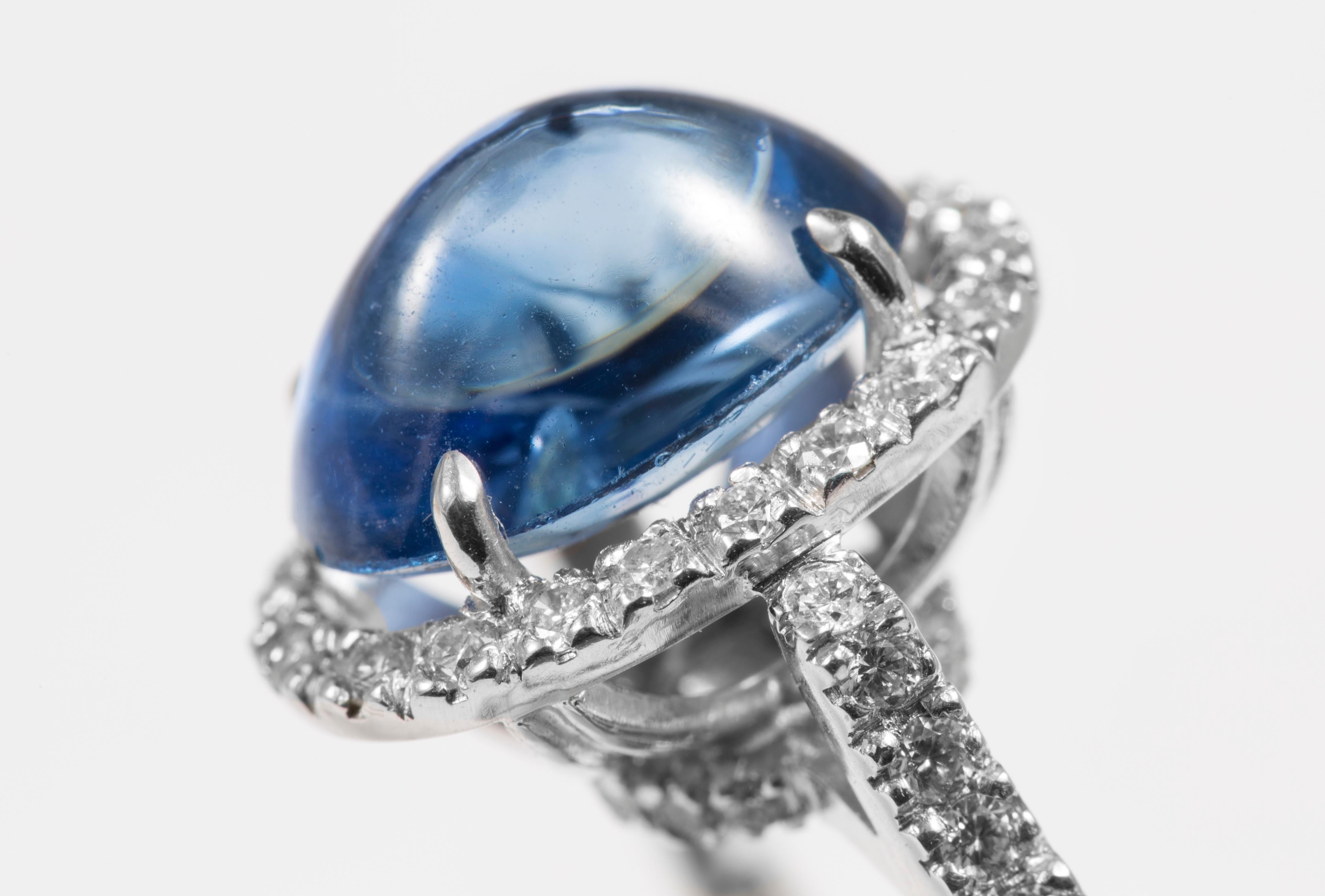 Burmese Blue sapphire Ring with Diamonds in 18K white gold

Ring size: 6.5 ( can be sized )

18K Gold: 6.20gms
Blue Sapphire: 5.10cts
Diamond: .45cts
