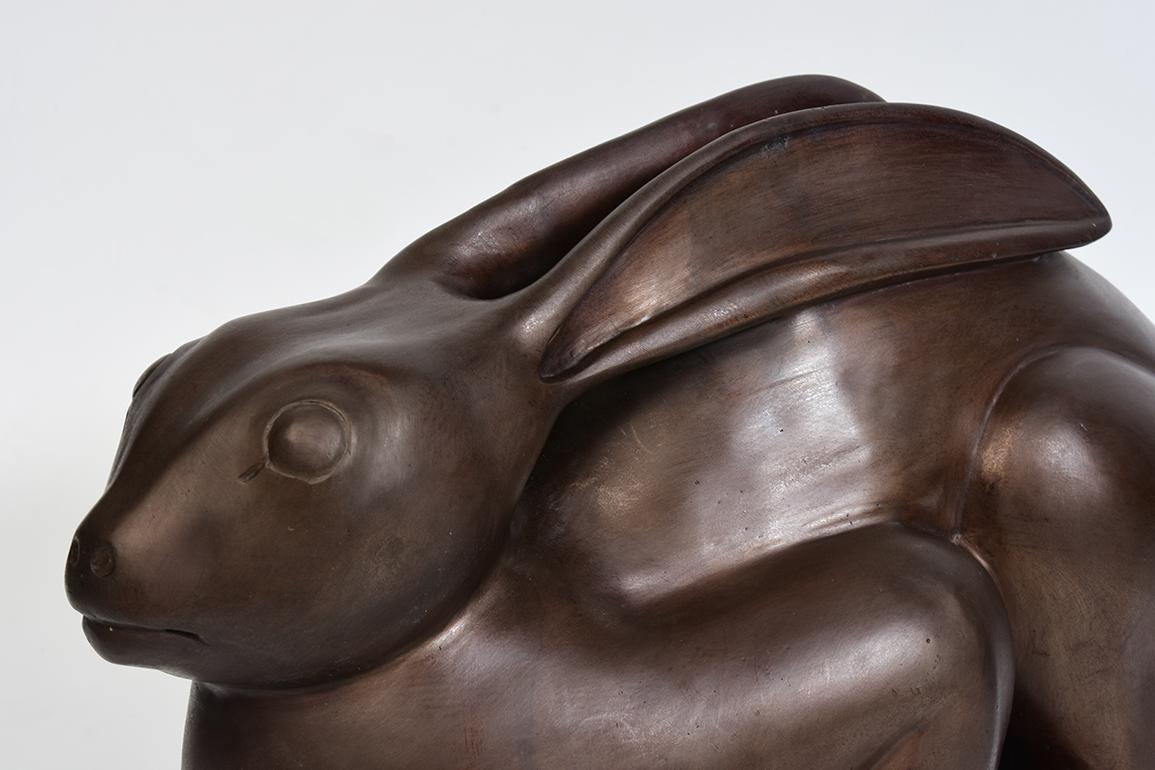 Burmese bronze rabbit.

Age: Burma, Contemporary
Size: Height 25.5 C.M. / Width 19.5 C.M. / Length 53 C.M.
Condition: Nice condition overall.