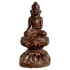 Burmese Carved Teak and Lacquered Buddha, Ava Period, 18th Century