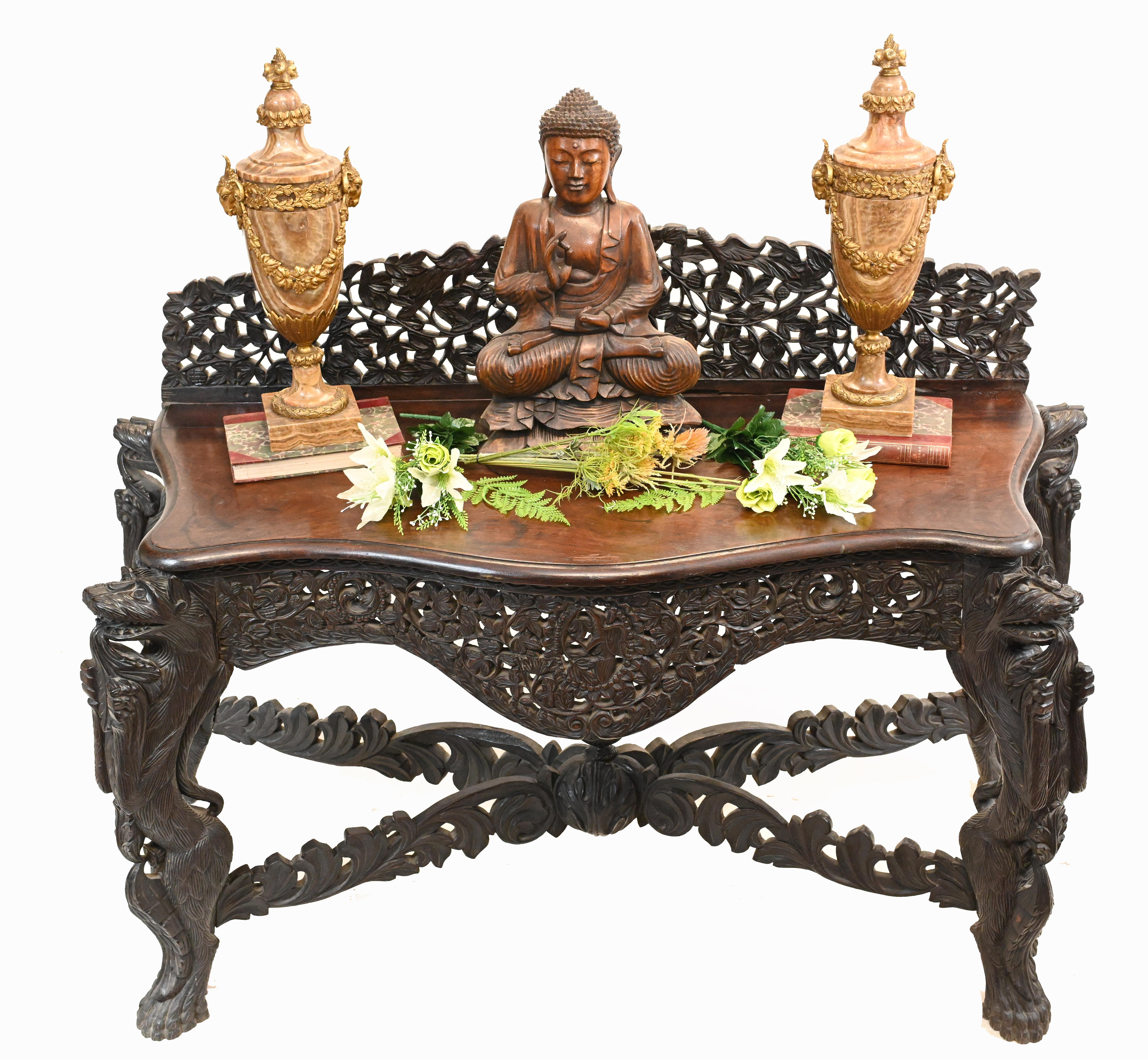 We seem to have acquired a batch of fine Burmese furniture of late - hats off to our buying team
This is a wonderful piece of Burmese furniture in the form of a console table
As expected the carving is superb, highly decorative and detailed, the