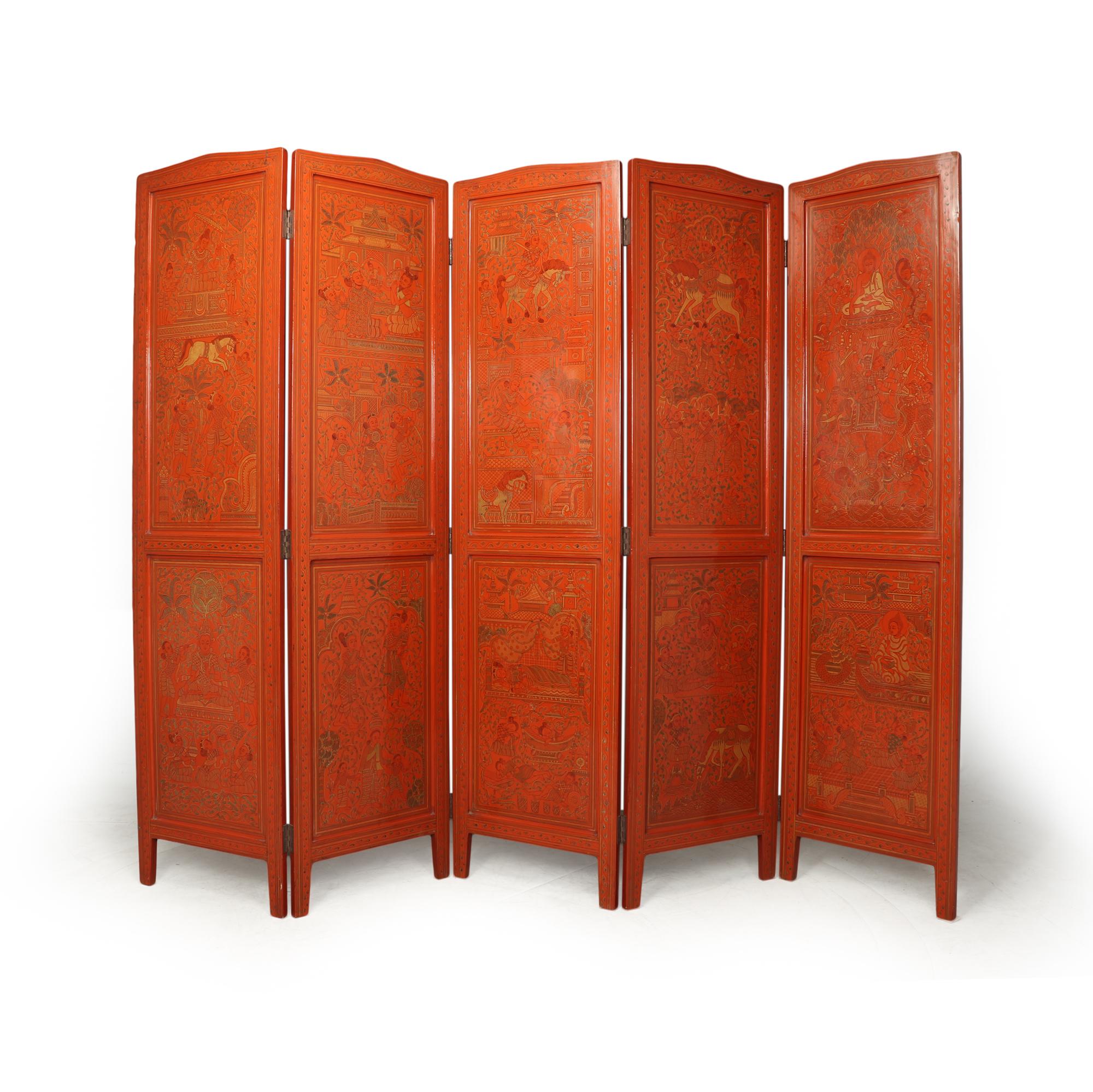 A rare five fold lacquered screen produced in Burma in the 1930’s, the screen has very fine line-work art including mystical creatures, Buddahs, temples and local people this is on both sides making it good for use as a room divider

the screen is