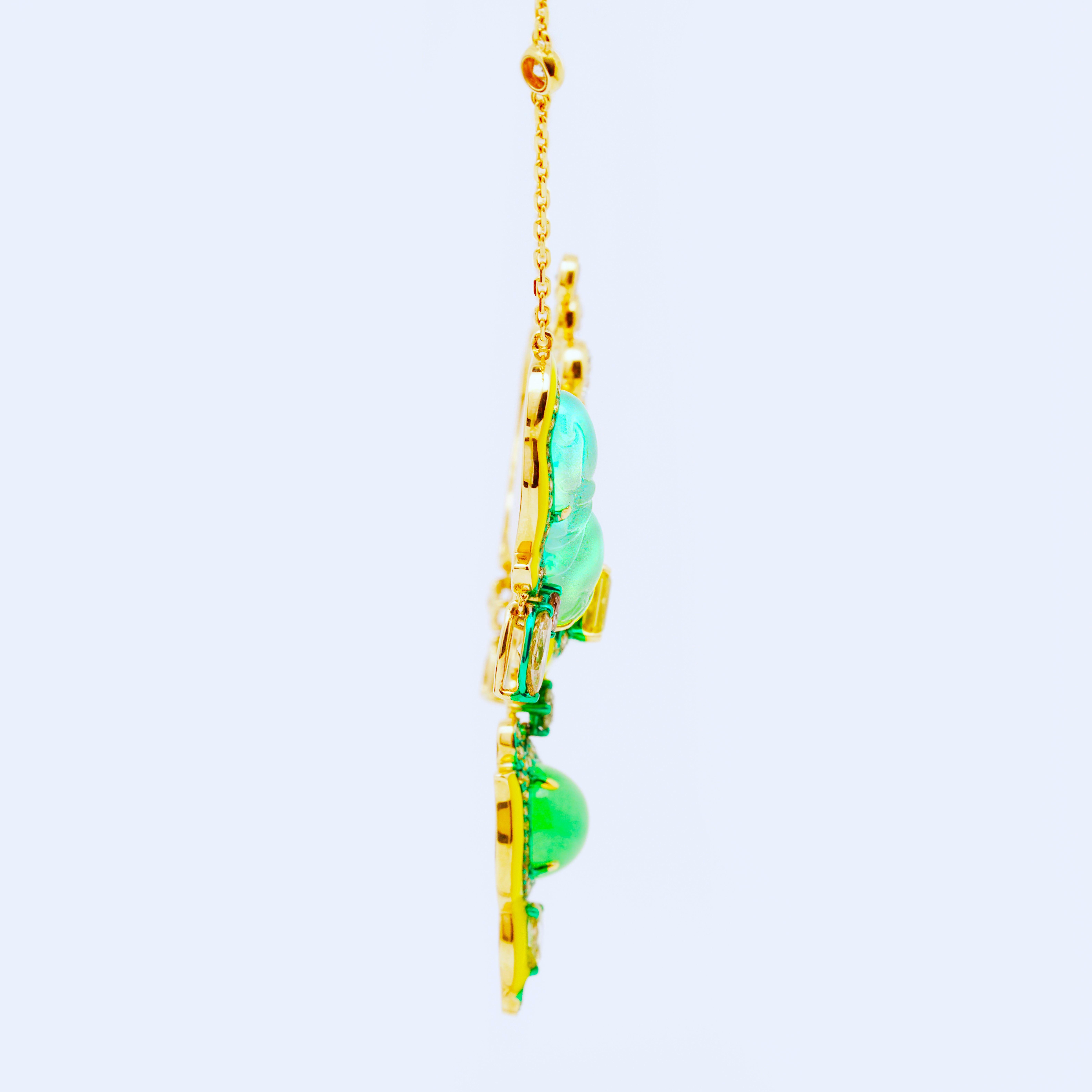 The Golden Fishes' Love Necklace from 'The Jade Dynasty Collection' by Austy Lee. This timeless piece is designed in an adorable and romantic way - with a pair of fishes face-to-face 'bubbling' one another. The Goldfishes are carved Natural Burmese
