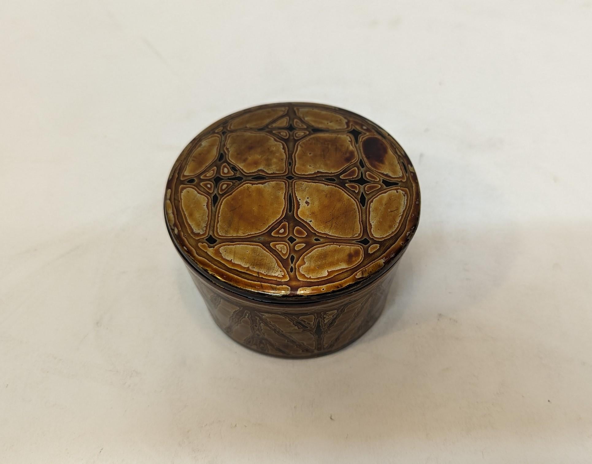 Burmese Lacquer box.  Round Burmese Vintage Lacquer Box. 
Special lacquering technique to make the color and design on this lacquer piece. Unlike most Burmese Lacquerware this is not etched design. The design is achieved through layering of the