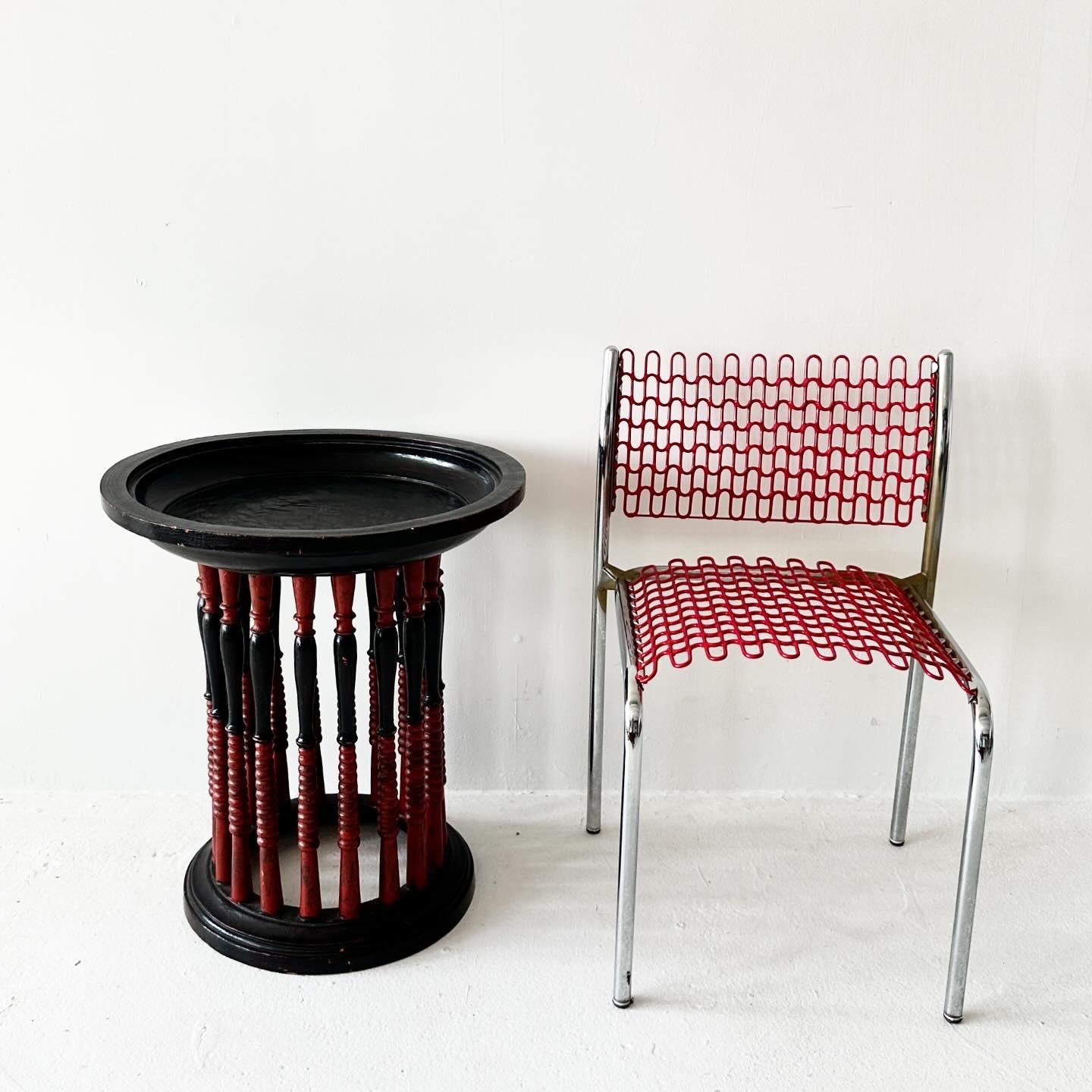 Burmese Lacquerware Red and Black Turned Wood Round Side Table

H24.25 L21.5 W21.5

Good vintage condition. There are some charming scuffs where the paint is peeking though.