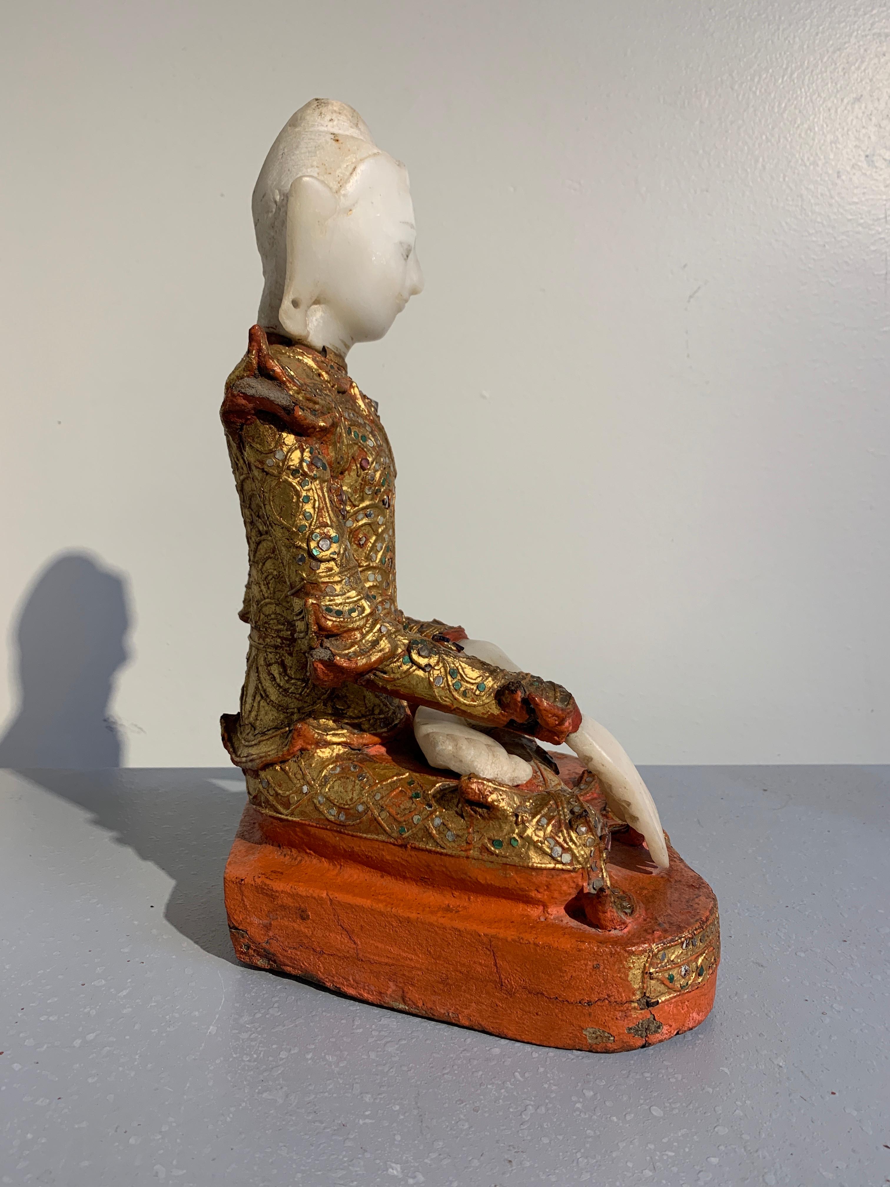 Burmese Mandalay Buddha in Royal Attire, Alabaster, Gilt Lacquer and Teak In Fair Condition In Austin, TX
