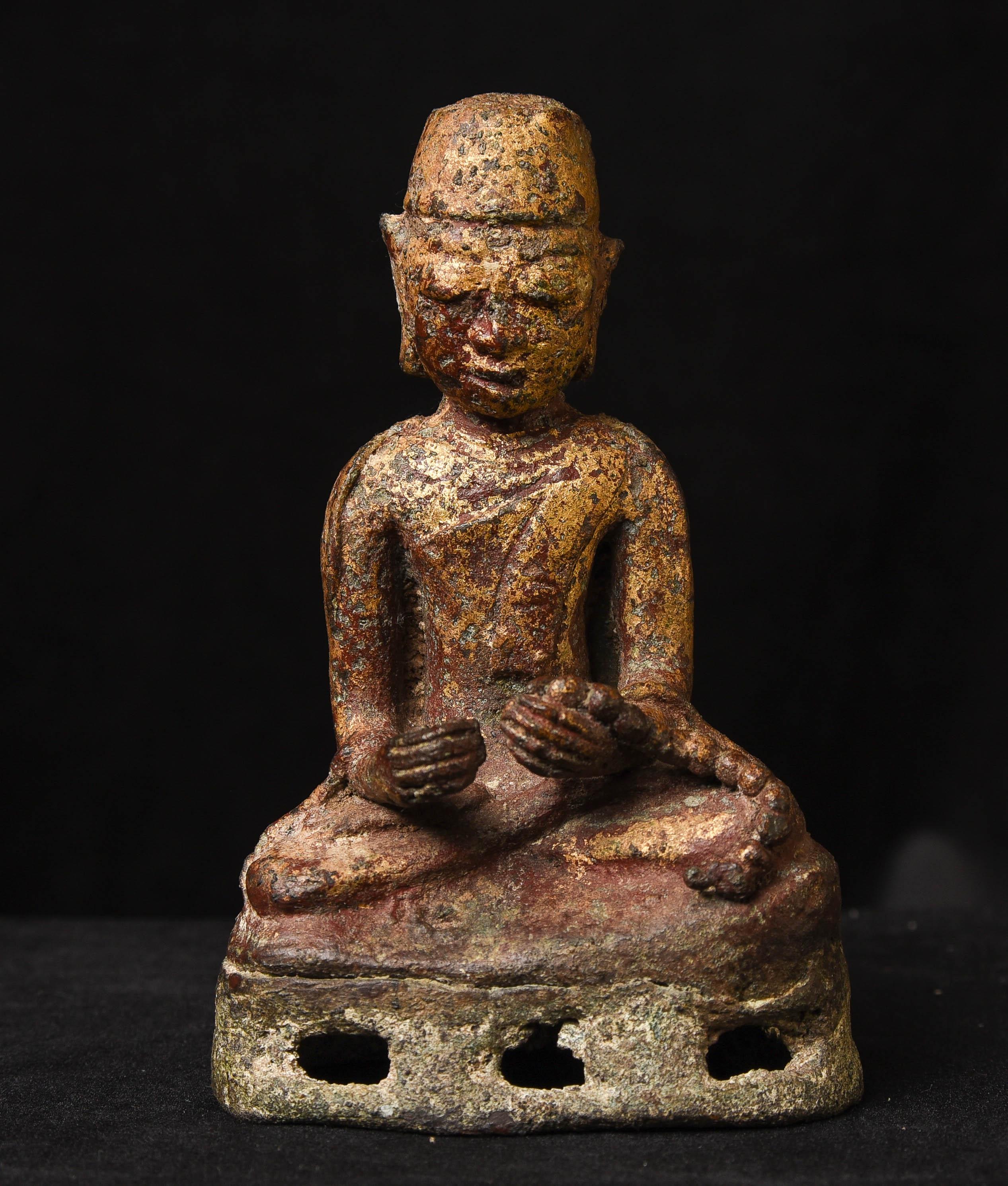 Early Burmese Monk. Cast out of a lead/bronze alloy. Probably over 1,000 years old looks to be a very rare Pyu/Mon example, and likely contemporary with early Pagan. The bulbous eyes and short ears are characteristic of this early period. Cannot