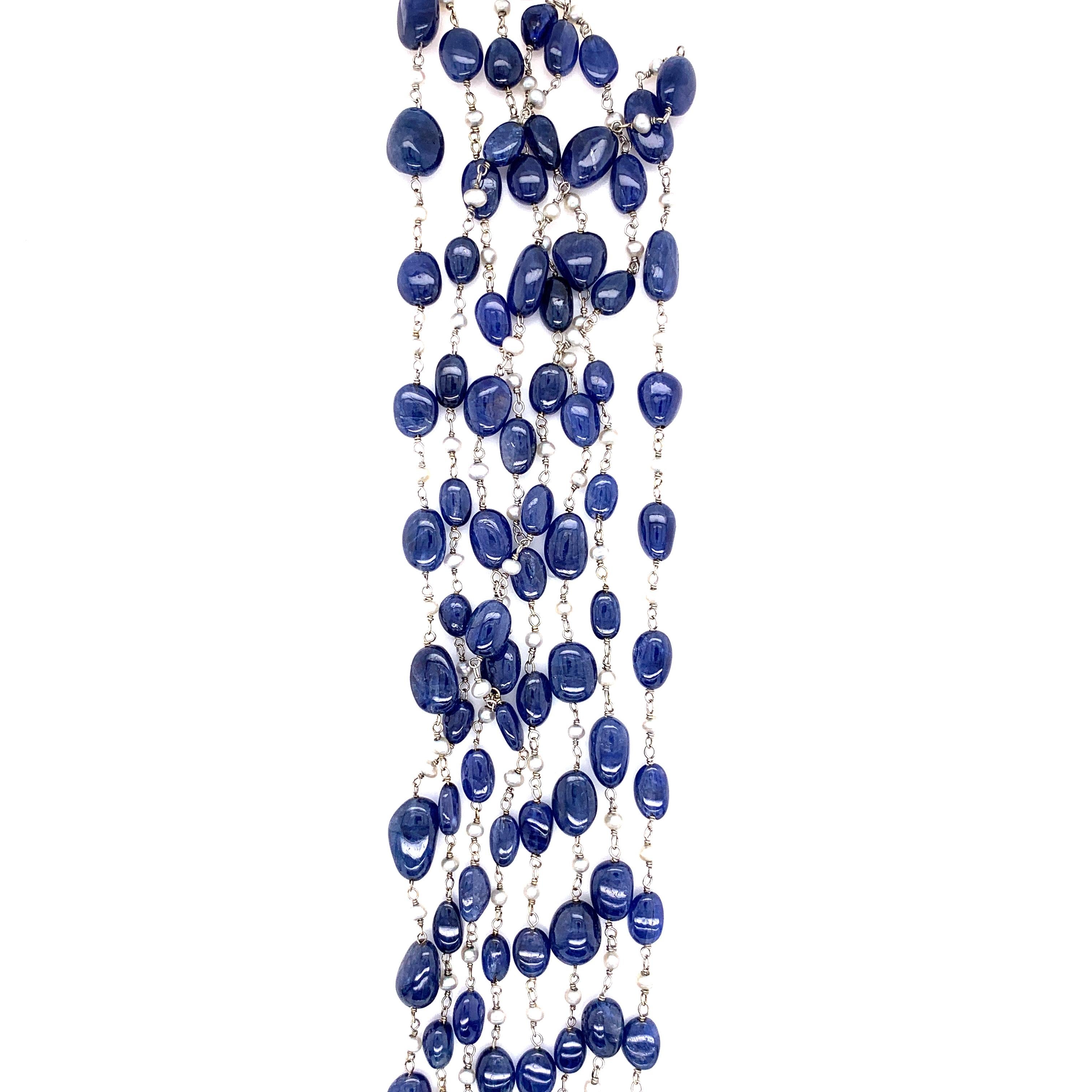 Burmesische No Heat Saphir Perlen und Südsee-Zuchtperle 18K Gold Halskette:

Die wunderschöne Halskette besteht aus üppigen, unerhitzten burmesischen blauen Saphiren mit einem Gewicht von 147,40 Karat und weißen Südsee-Zuchtperlen mit einem Gewicht