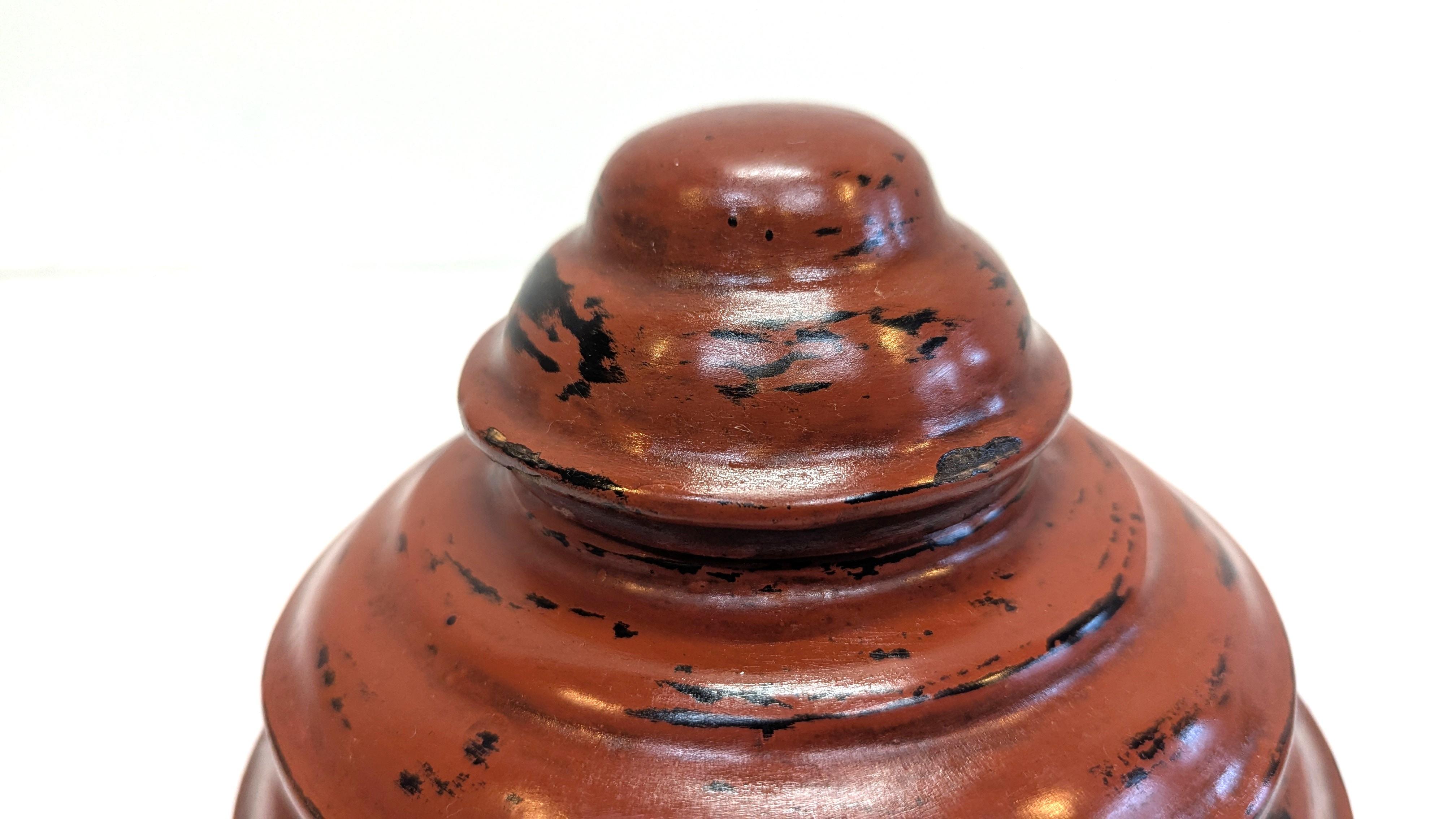 Burmese Buddhist Offering Box Ok-khwet Lacquerware, early 20th century.  
Tiered round offering box lacquered, basket-shaped box or vessel traditionally used to present food offerings to a monastery or temple.  This Ok-khwet round box has much