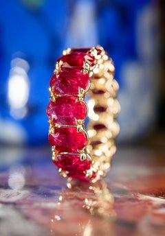 Burmese Oval Cut Ruby 8.5ct Eternity Band in 18K Yellow Gold