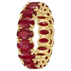 Burmese Oval Cut Ruby 8.5ct Eternity Band in 18K Yellow Gold