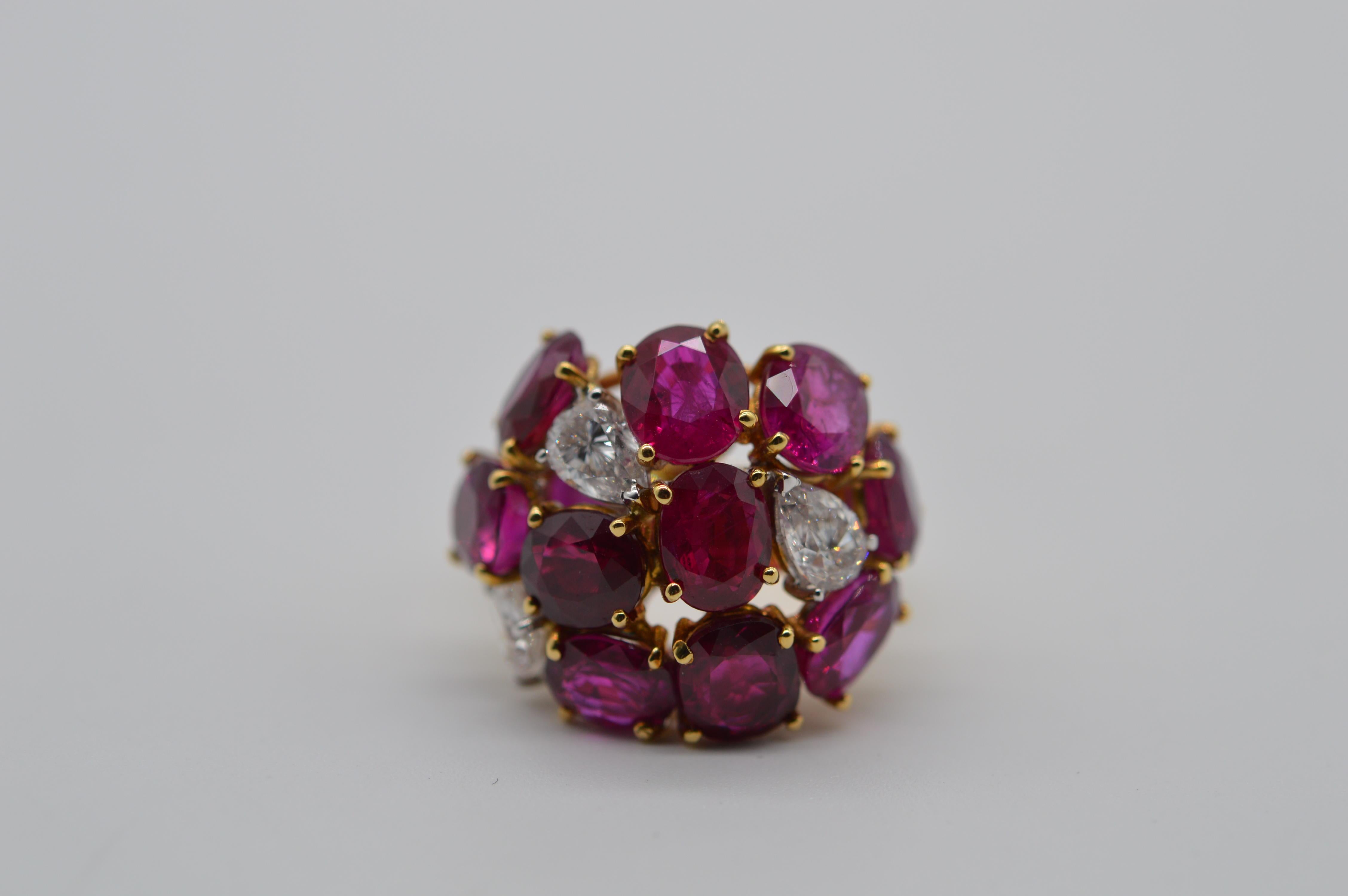 Burmese Oval Ruby 8.40 carats ring unworn
Mounted in an 18K Yellow Gold Ring
The ring size is 51
The total weight of the ring is 10.7 grams
Set with 3 Pearshape Diamonds for a total weight of 0.85 carats
Unworn condition