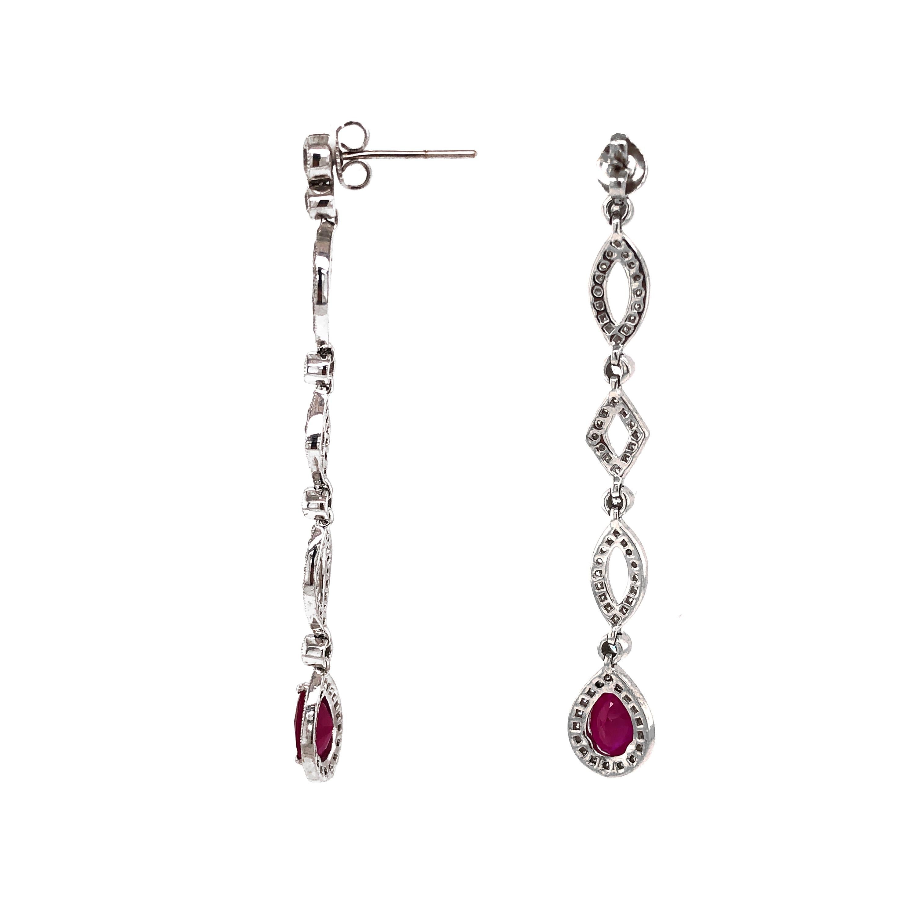 Simple and elegant platinum dangling earrings with center Burmese ruby stones of 3.84 carat in total.
Accented by round diamonds 2.61 carat in total.
Diamonds are natural and white in G-H Color Clarity VS.
Platinum 950 metal.
Butterfly studs.
Width: