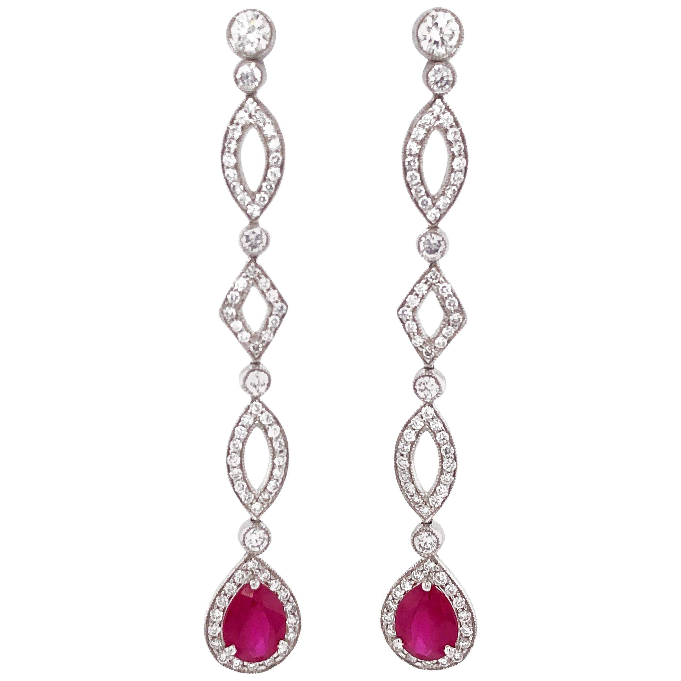 Burmese Pear Cut Ruby 3.84 Carat Round Diamond Dangling Platinum Earrings For Sale