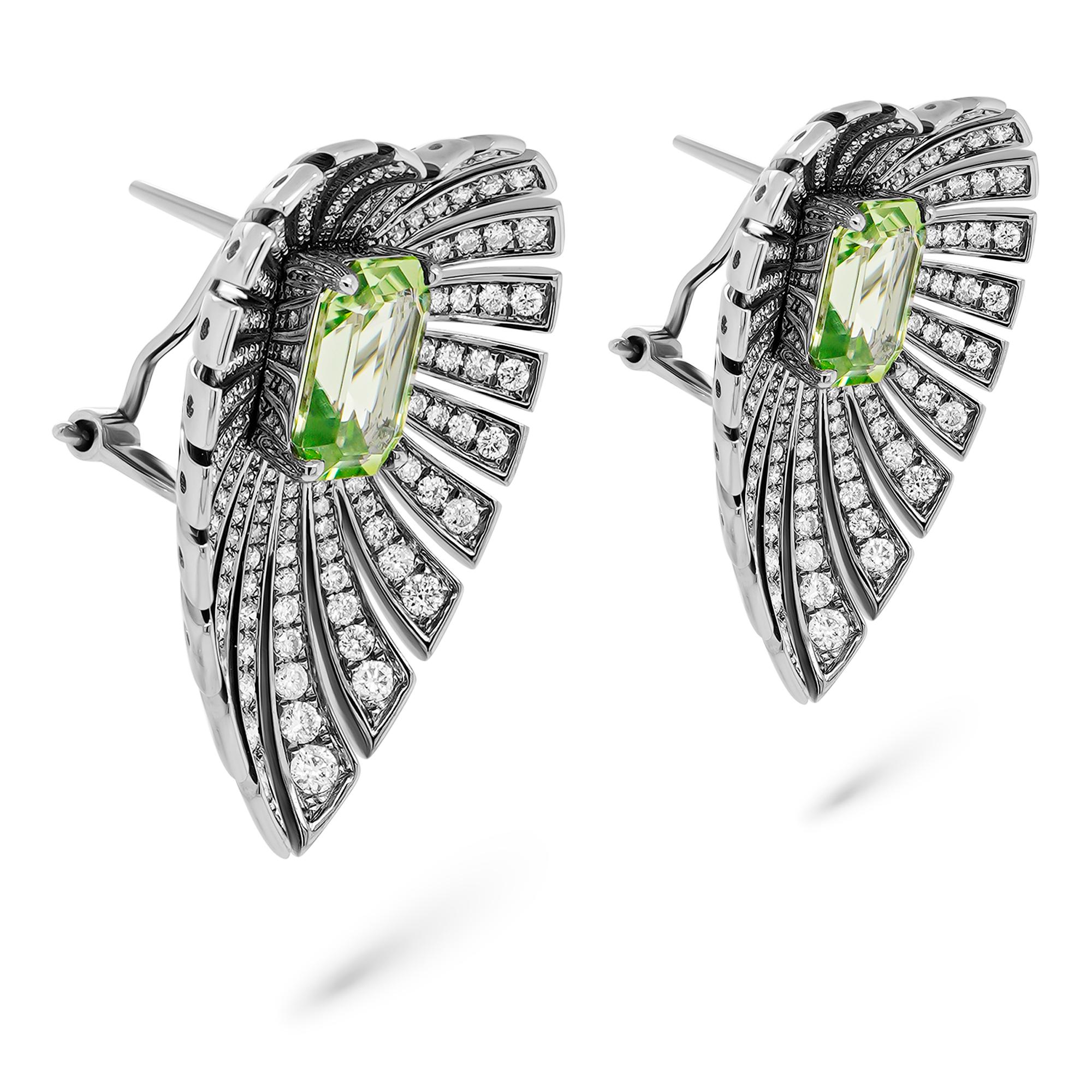 
The current earring is set in 18K gold and has 4.12 carats of Burmese Peridot. The earring is studded with 1.82 carat of D color VVS clarity diamonds.

Peridot has always been associated with light. In fact, the Egyptians called it the “gem of the