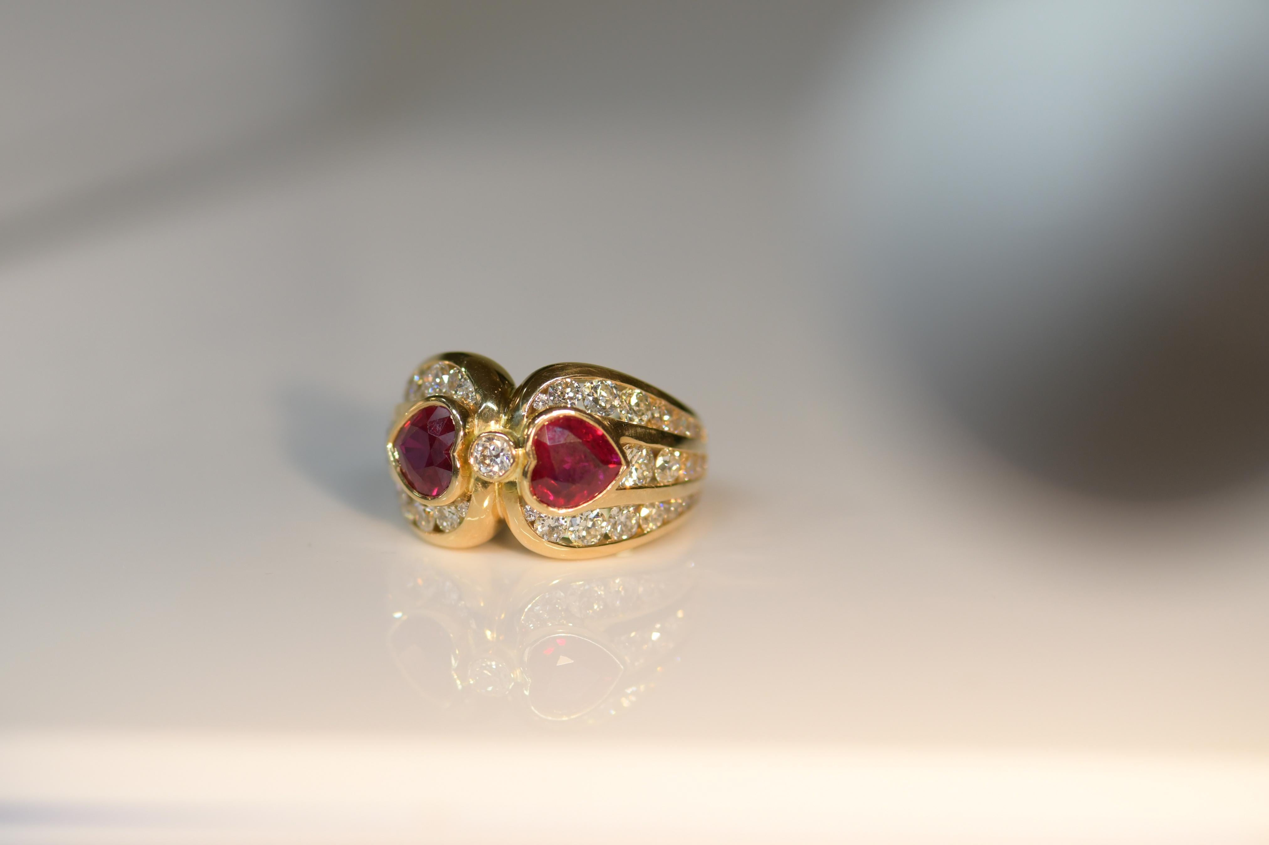 A fantastic 18ct gold double heart ring set with two good well matched natural heart shaped Burma rubies surrounded by white diamonds. It would make a wonderful engagement ring.
Ruby Total：1.85 ct
Diamond：1.95 ct
SizeN
Weight：10.78g
