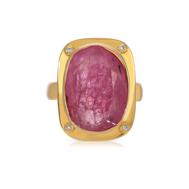 Burmese Pink Sapphire Diamond Cocktail Ring featuring a natural Burmese pink sapphire with exceptional luminosity set in a modern gold setting with brilliant cut diamond studded bezel corners.
- Natural Burmese Pink Sapphire 15.71  carats.
-