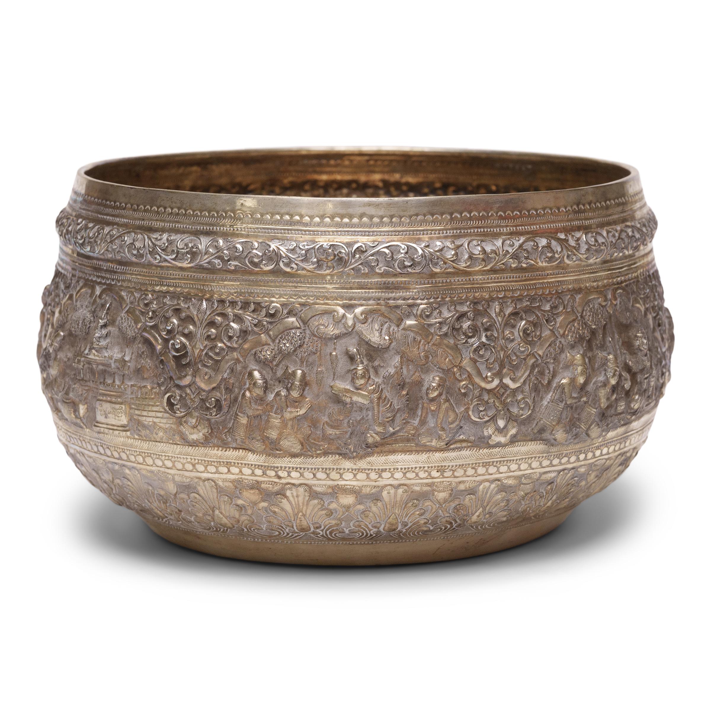 This elegant Burmese offering bowl is formed of hand-worked copper and finished with silver and gold plating for a lavish exterior. The form is based on Buddhist alms or begging bowls, or thabeik, used by Burmese monks. The copper alloy body was