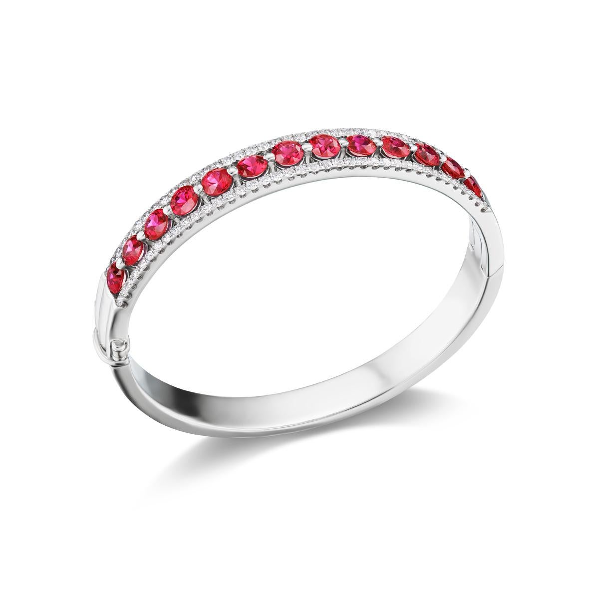 Gorgeous GIA certified Burmese Rubies and diamonds are secured in a classy prong setting which displays a beautiful hue of red throughout this gorgeous piece.