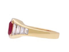 Burmese ruby and diamond flank solitaire ring, circa 1950.